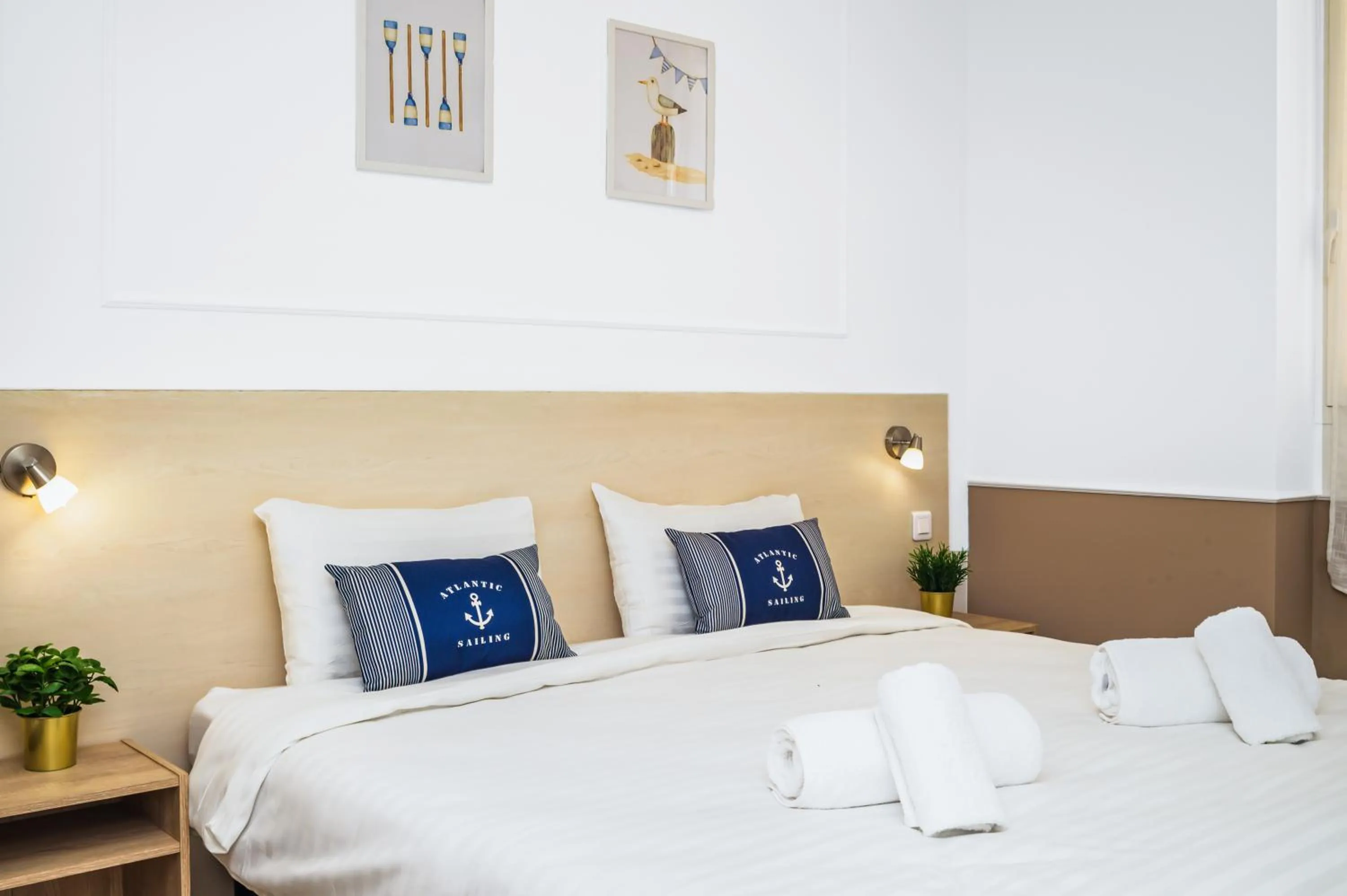 Bed in Hotel Parisien