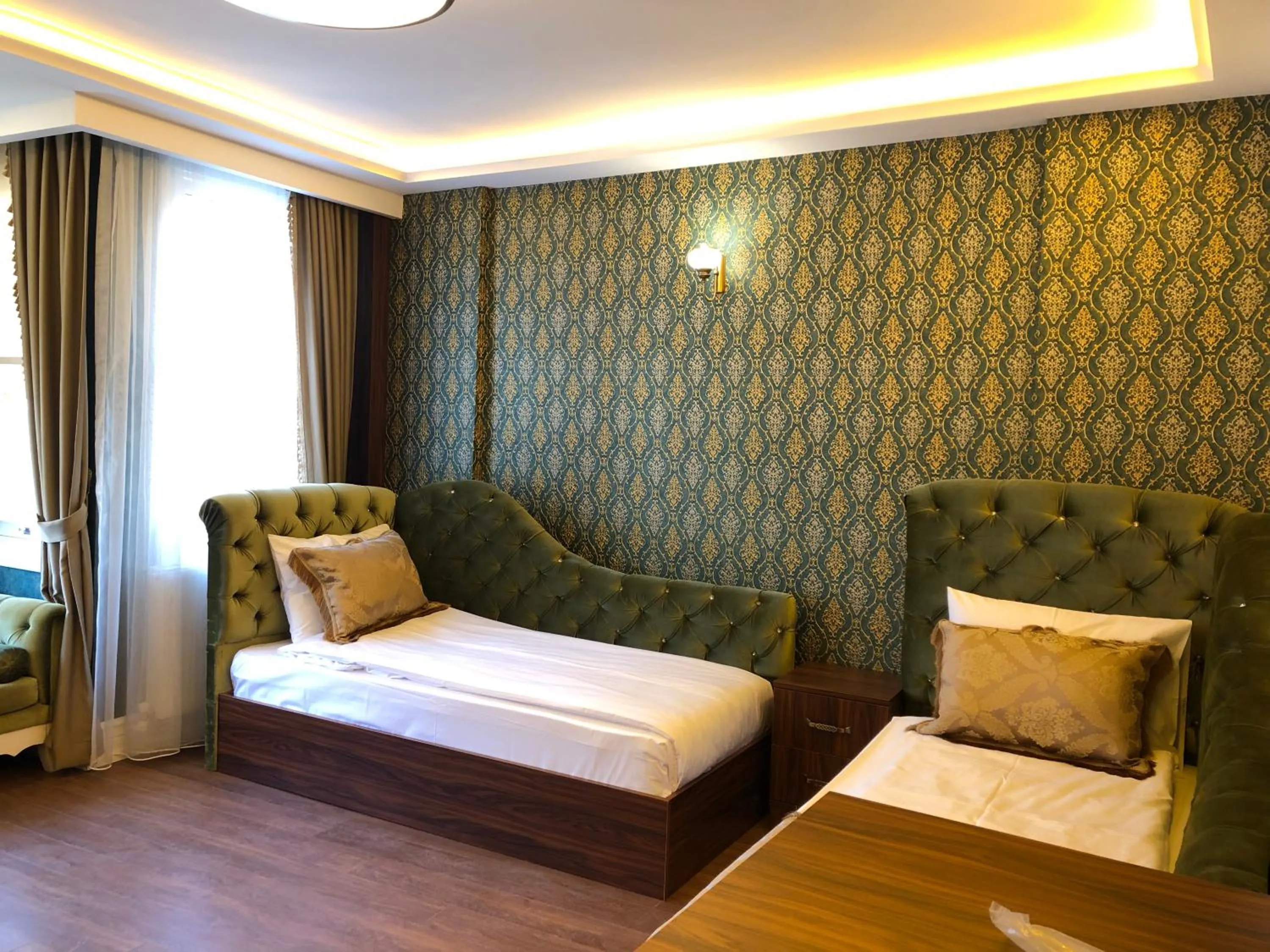 Living room, Bed in Rose Mansion by Otantik Suites