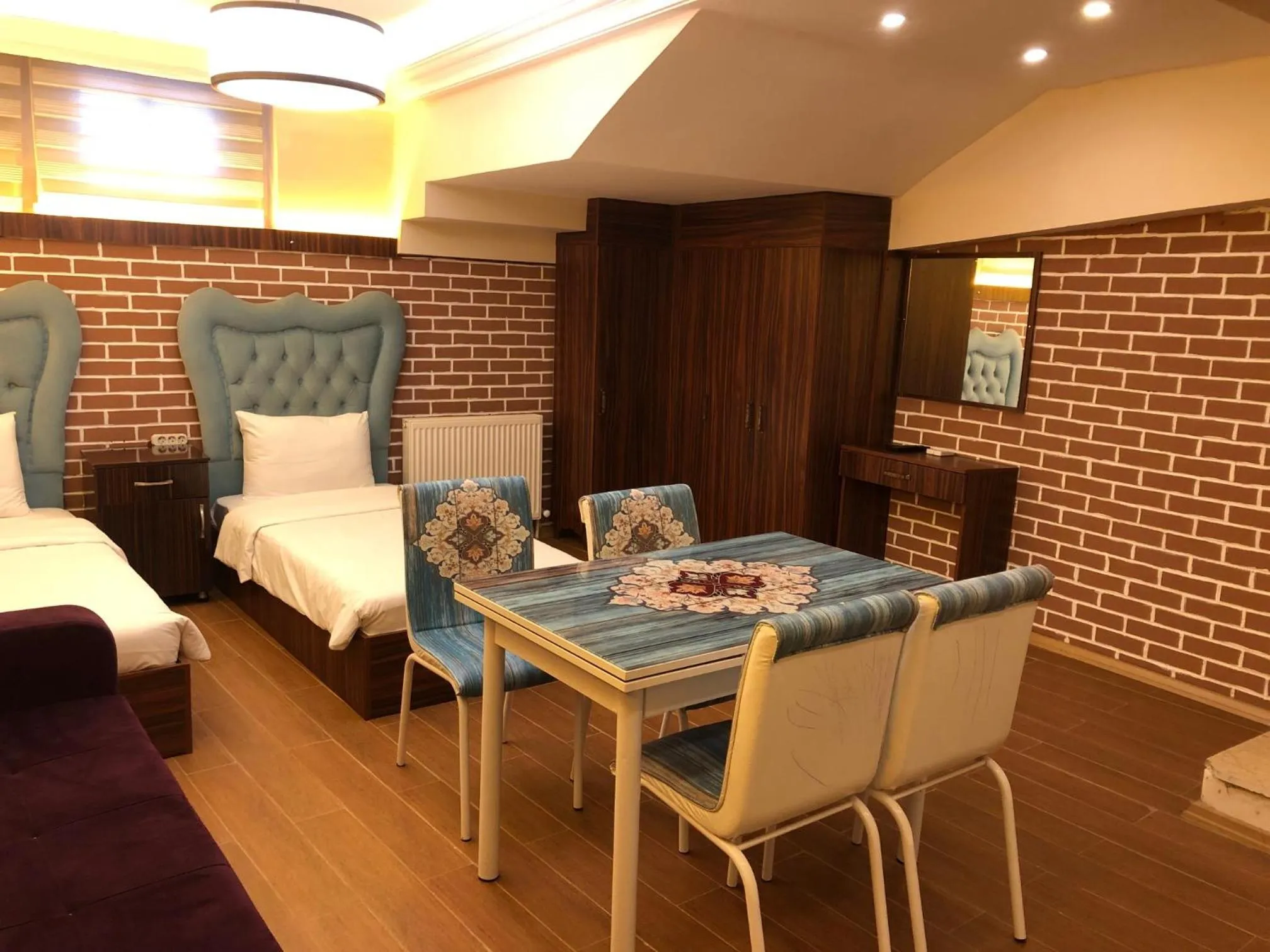 Living room, Bed in Rose Mansion by Otantik Suites