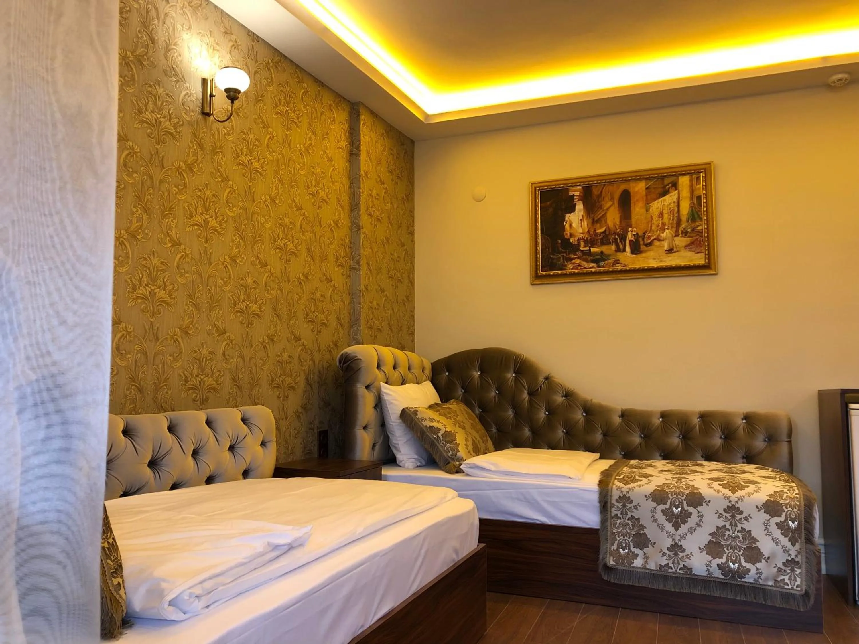 Living room, Bed in Rose Mansion by Otantik Suites