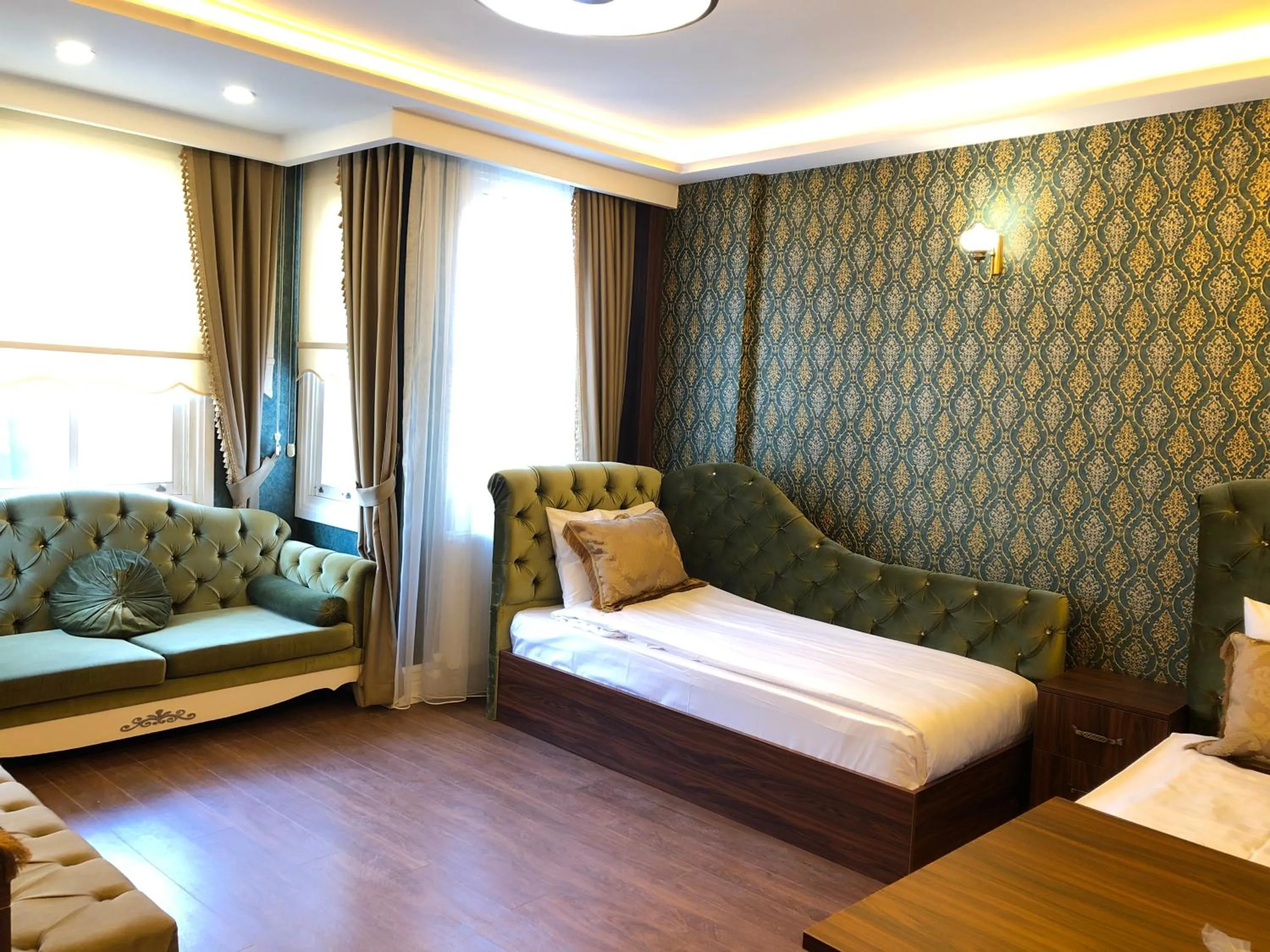 Living room, Bed in Rose Mansion by Otantik Suites