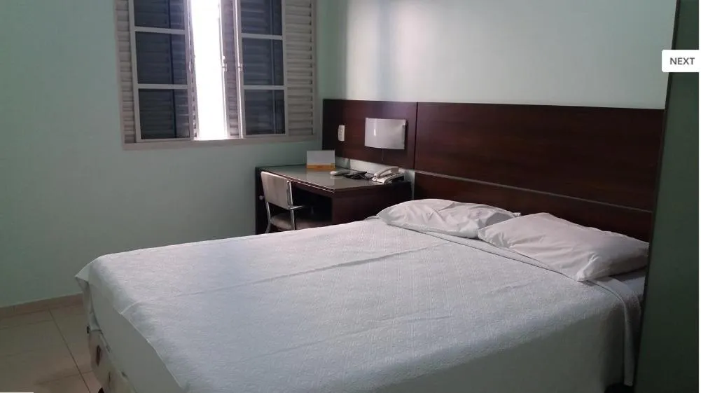 Bed in Uiramutam Palace Hotel