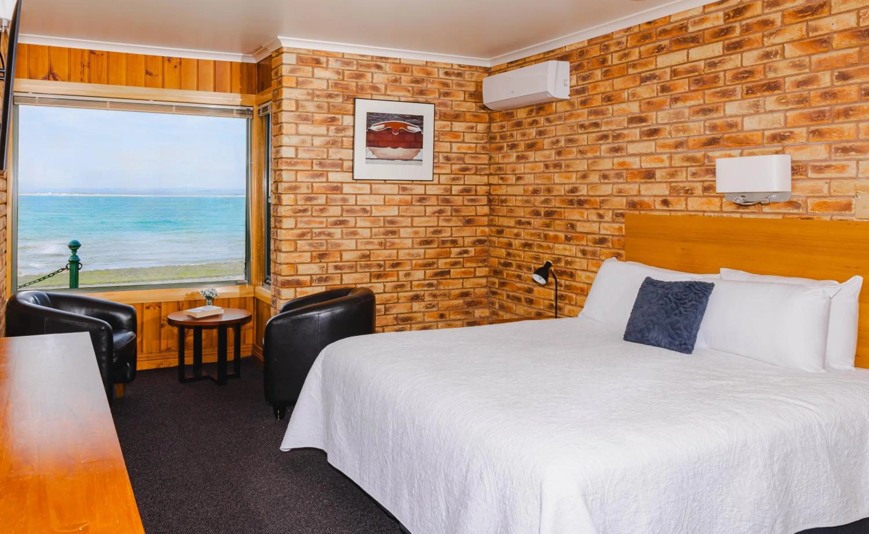 Bed in Stanley Village Waterfront Accommodation