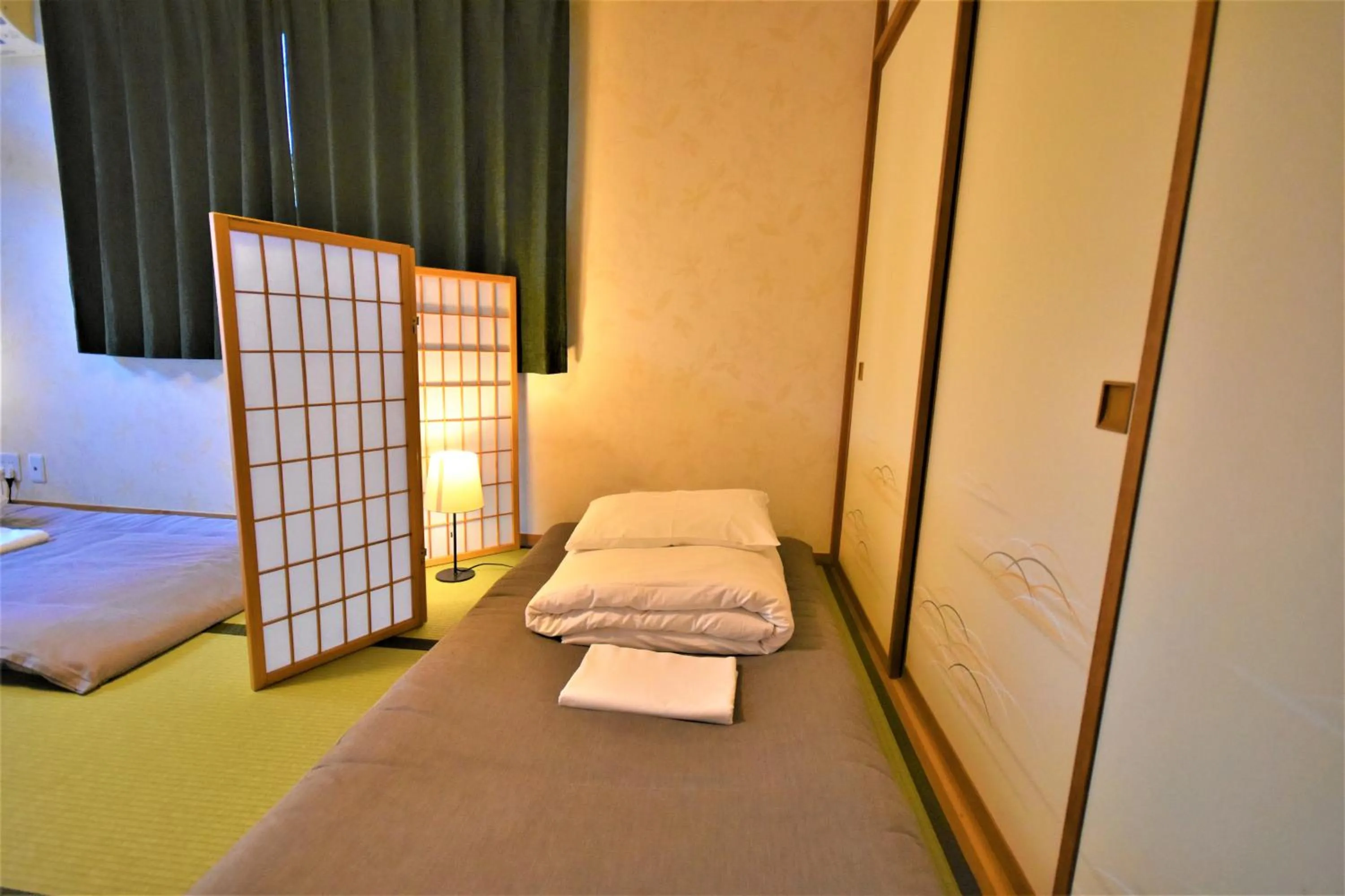 Bedroom, Bed in Hakone Guest House gaku.