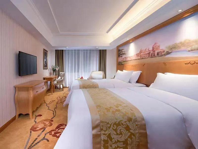 Bed in Vienna Hotel Guangdong Zhongshan Tanzhou