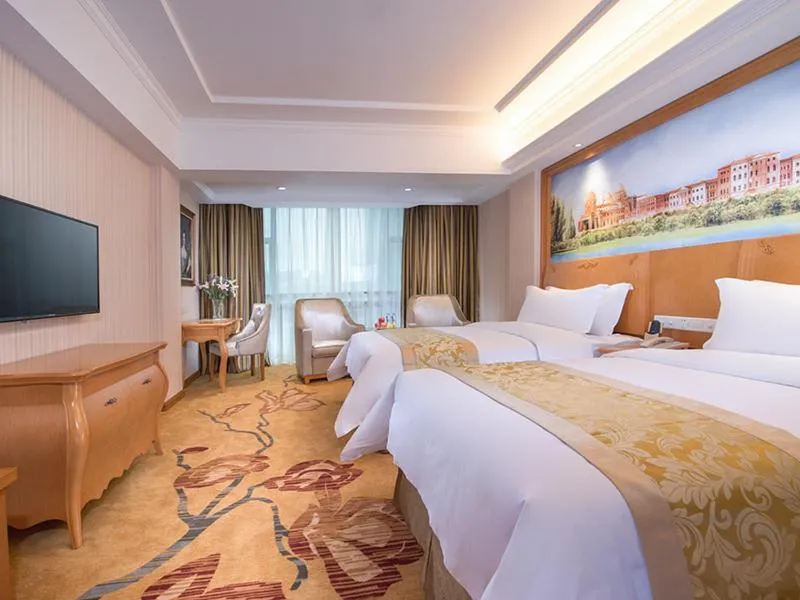 Bed in Vienna Hotel Guangdong Zhongshan Tanzhou