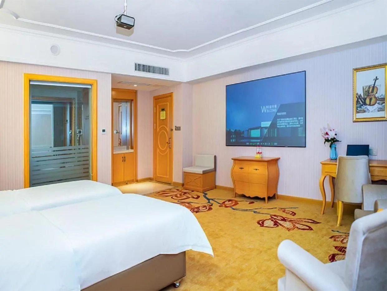 Bed in Vienna Hotel Guangdong Zhongshan Tanzhou