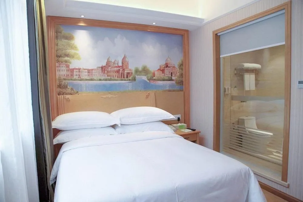 Bed in Vienna Hotel Qingyuan Yingde Guangming Road