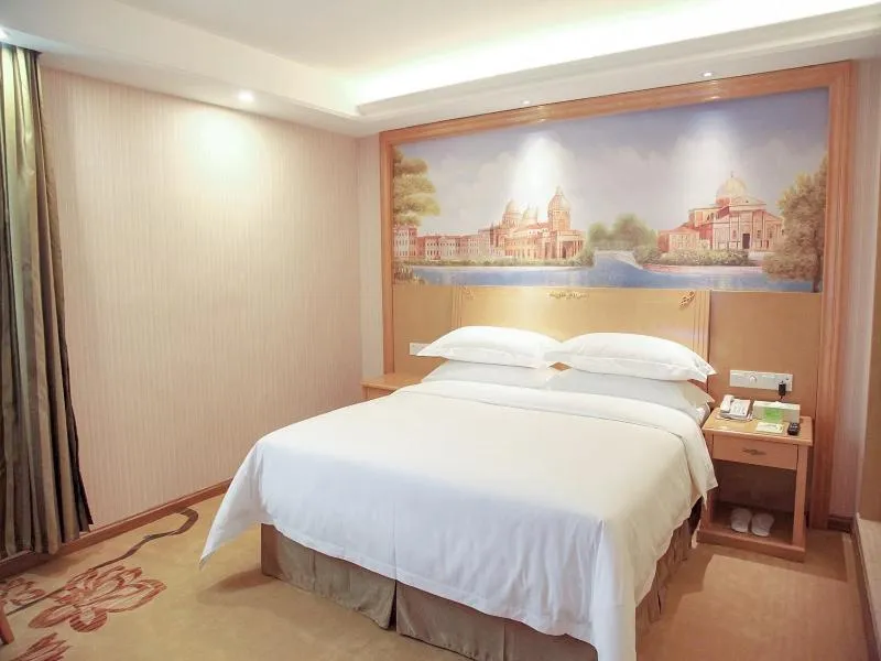 Bed in Vienna Hotel Qingyuan Yingde Guangming Road