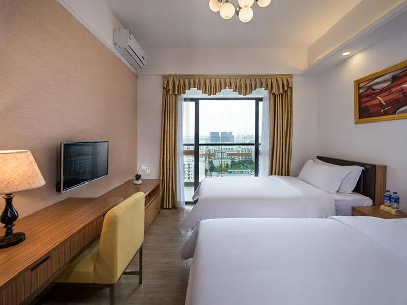 Bed in Vienna International Hotel Huizhou Daya Bay Century City