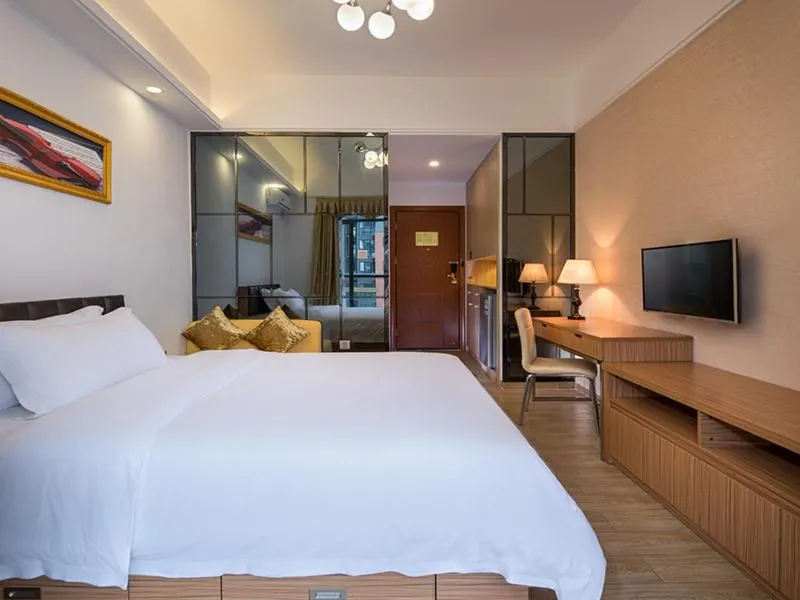 Bed in Vienna International Hotel Huizhou Daya Bay Century City