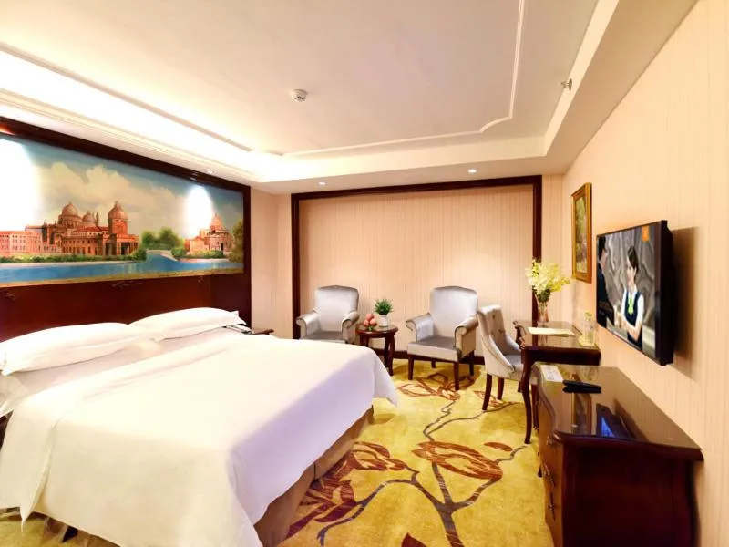 Bed in Vienna Hotel Loudi Chunyuan Pedestrian Street