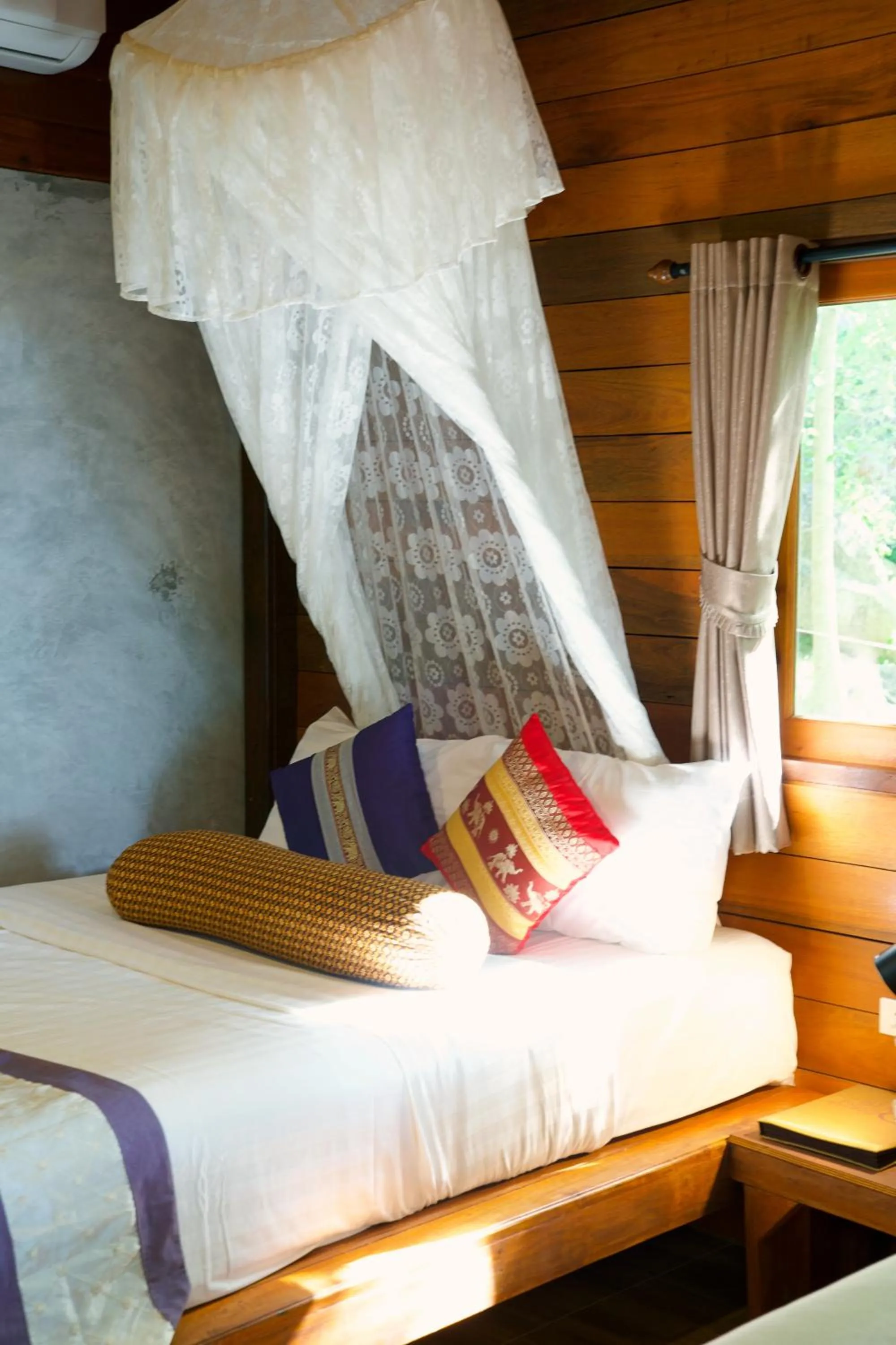 Bed in Sensi Paradise Beach Resort