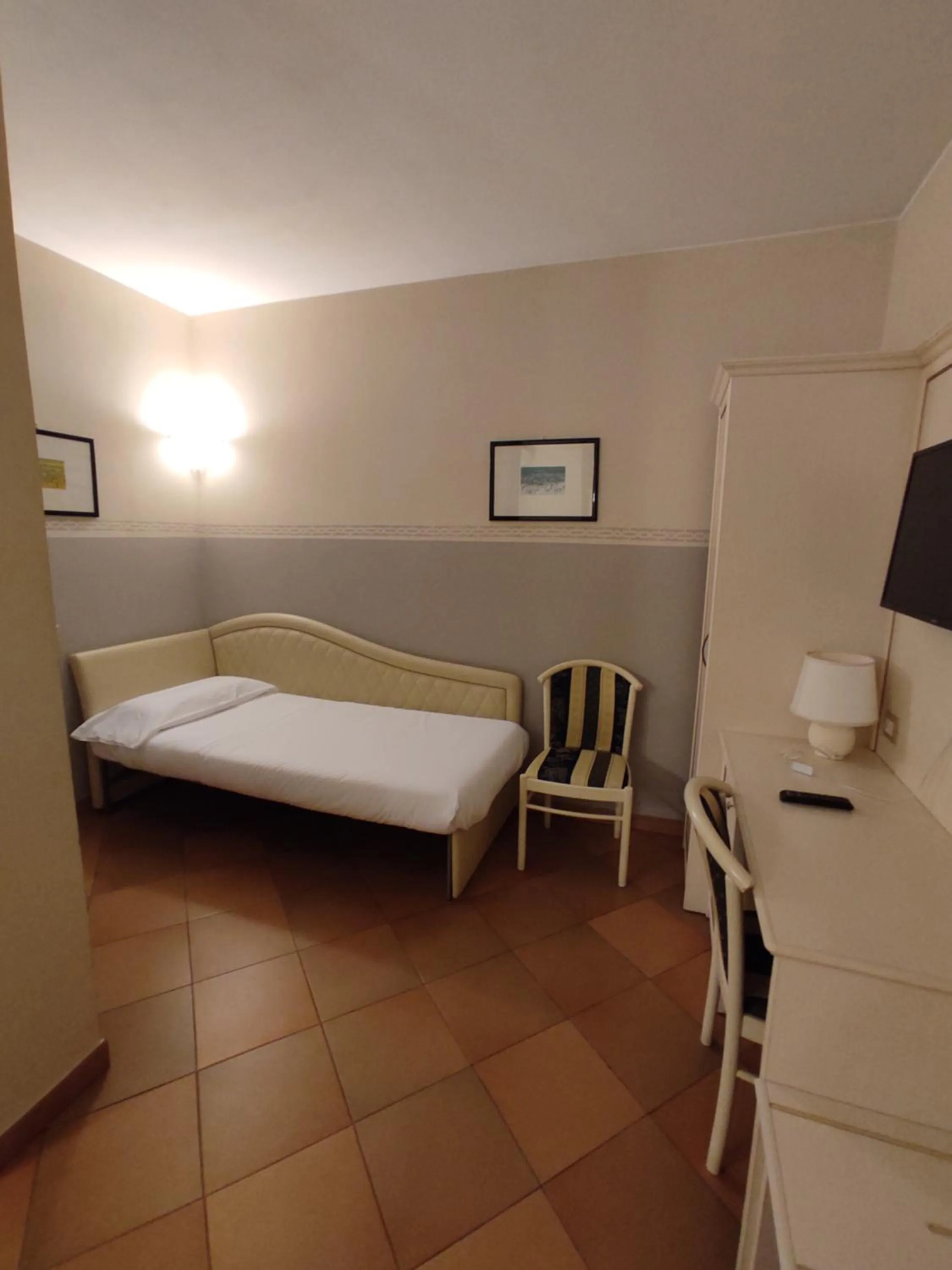 Bed in Hotel Le Mura