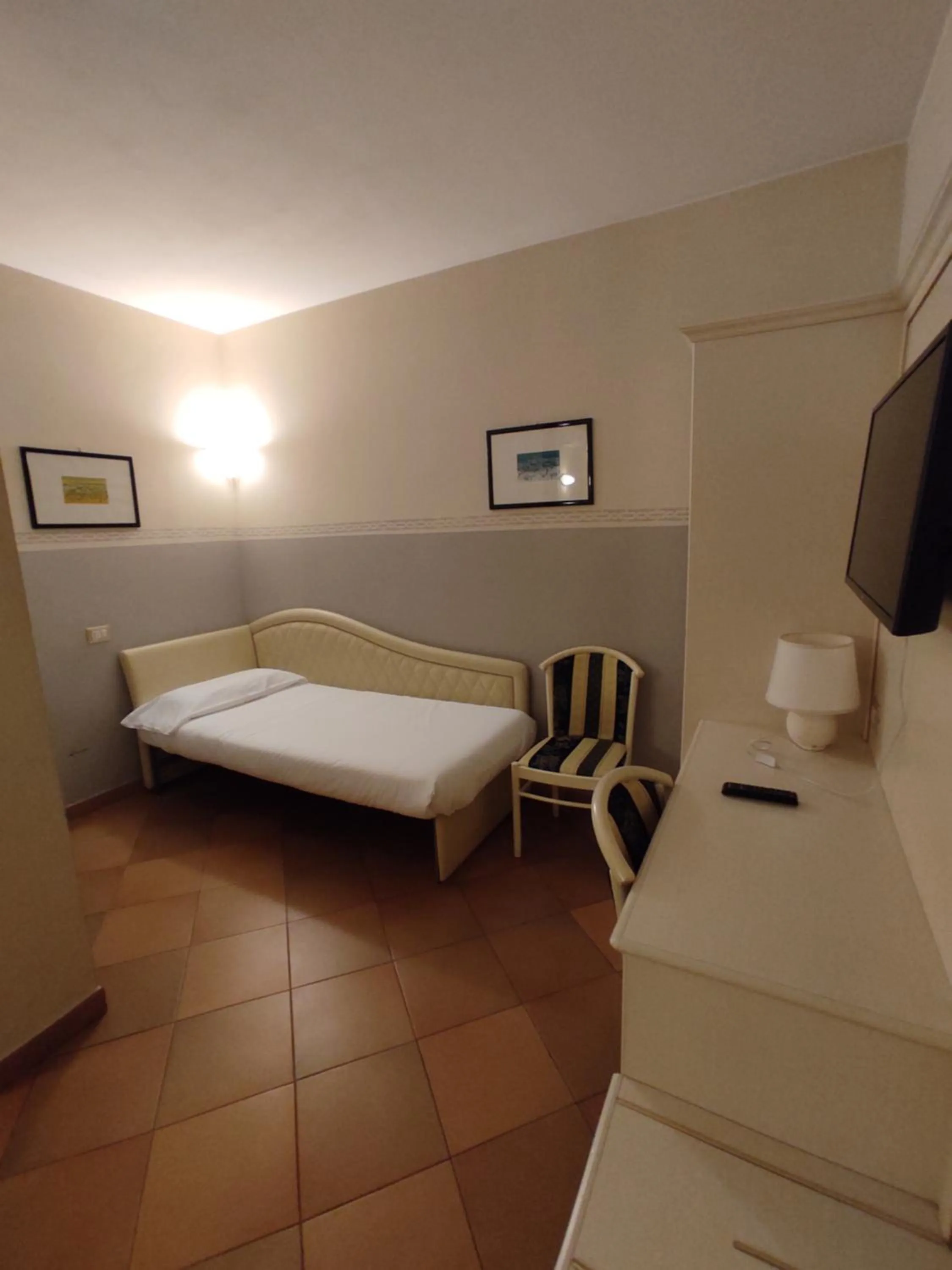 Bed in Hotel Le Mura