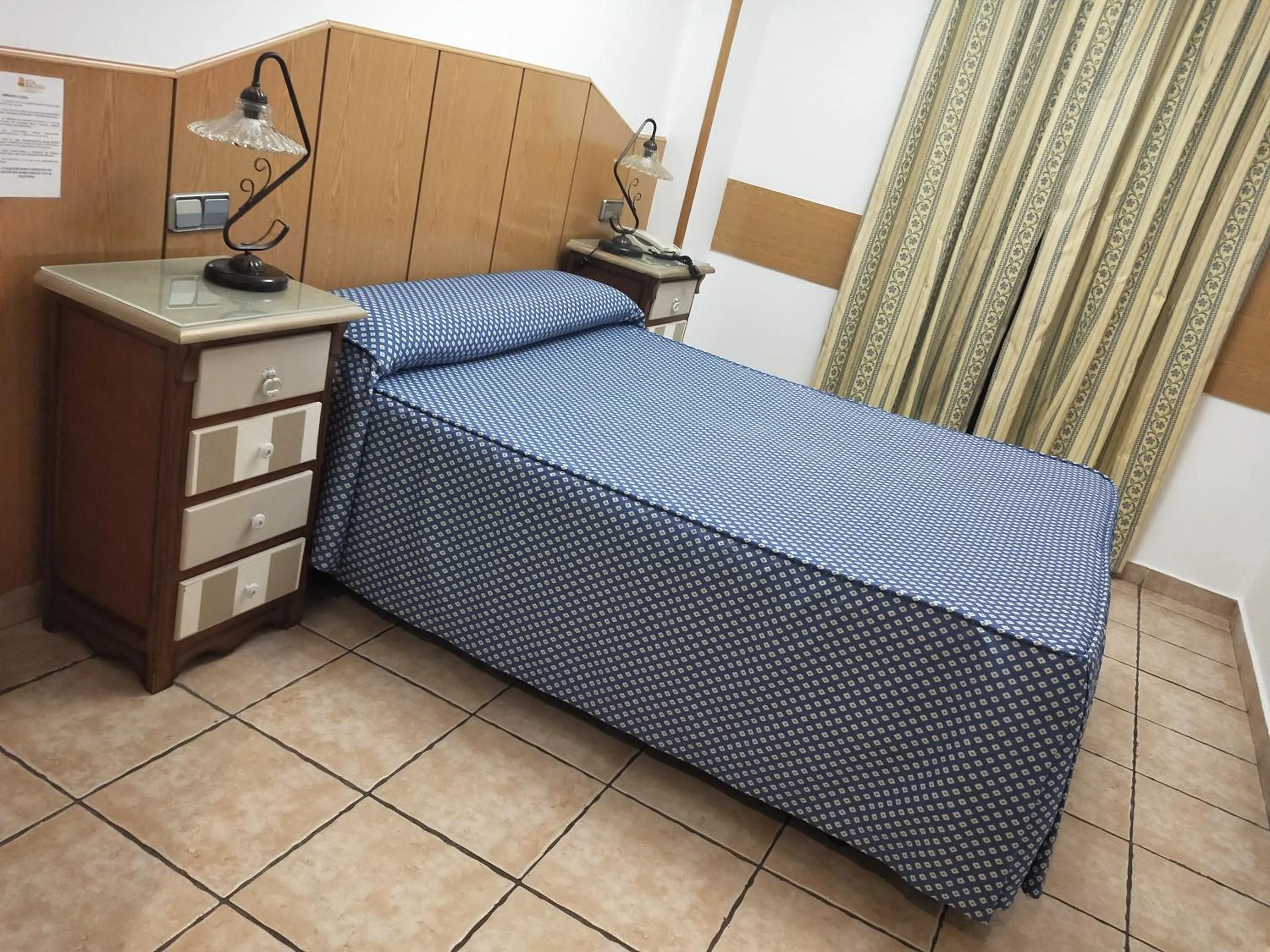 Bed in Hostal Maria Ronda