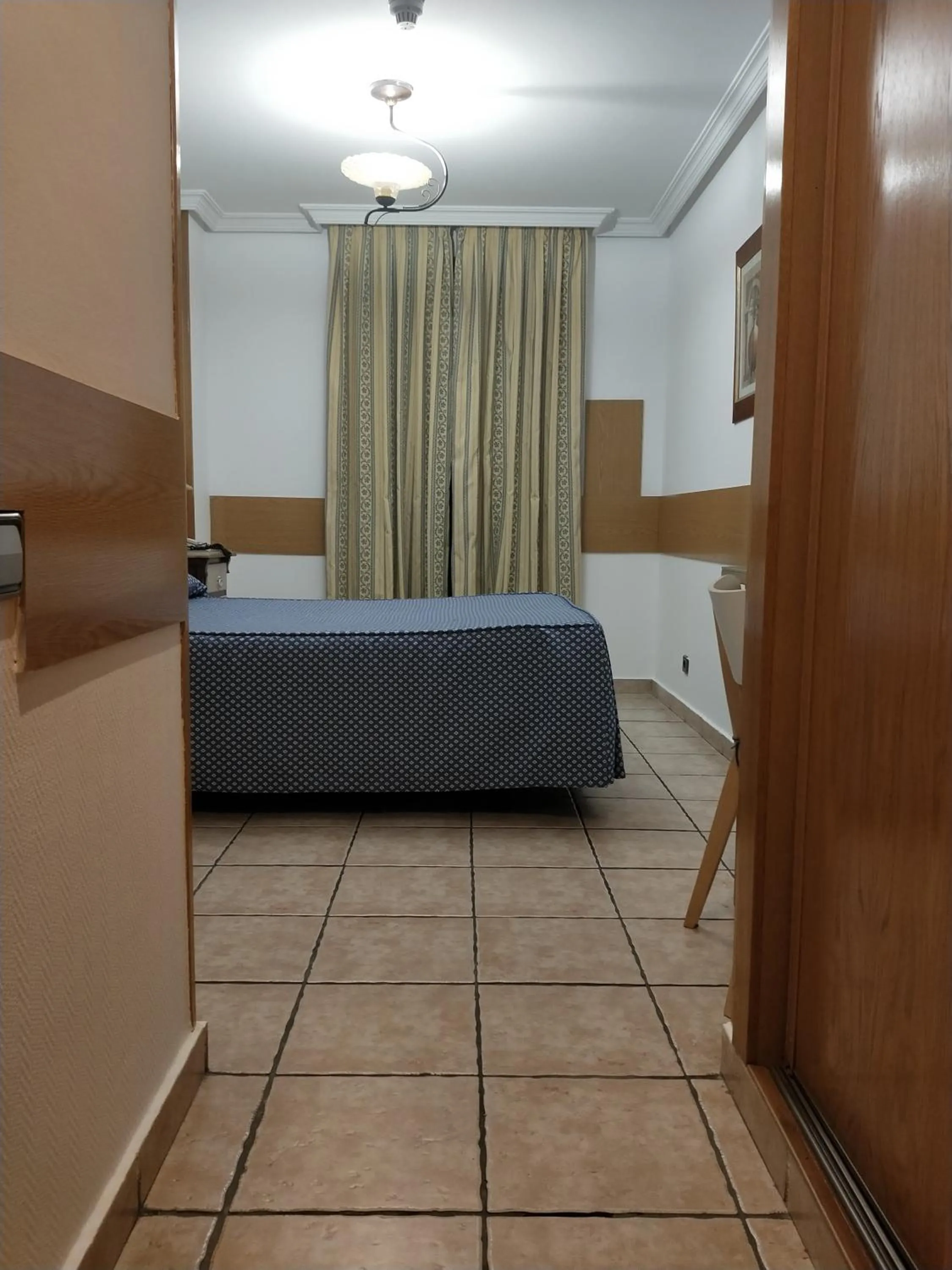 Bed in Hostal Maria Ronda