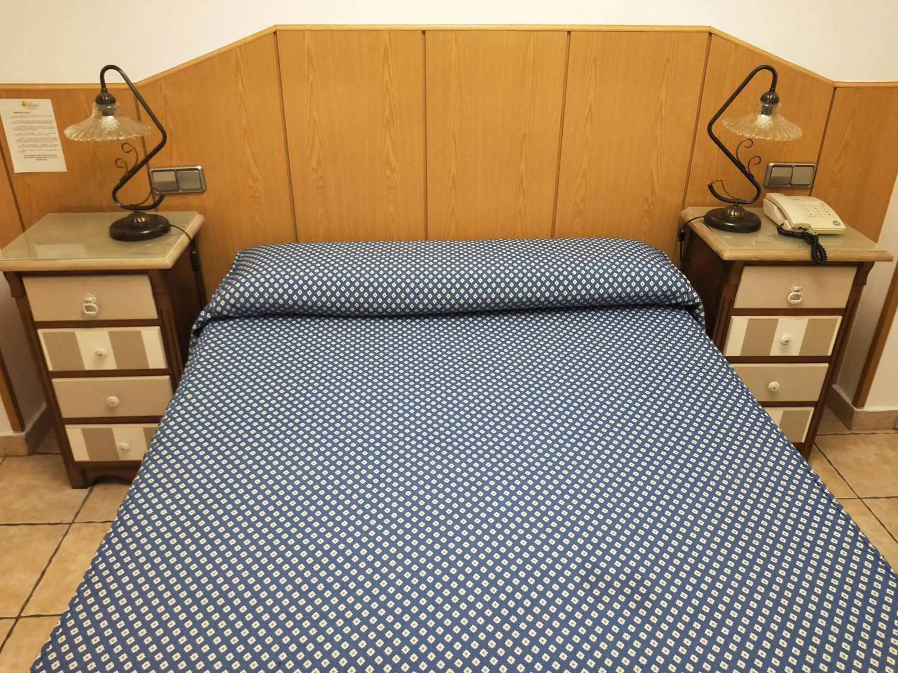 Bed in Hostal Maria Ronda