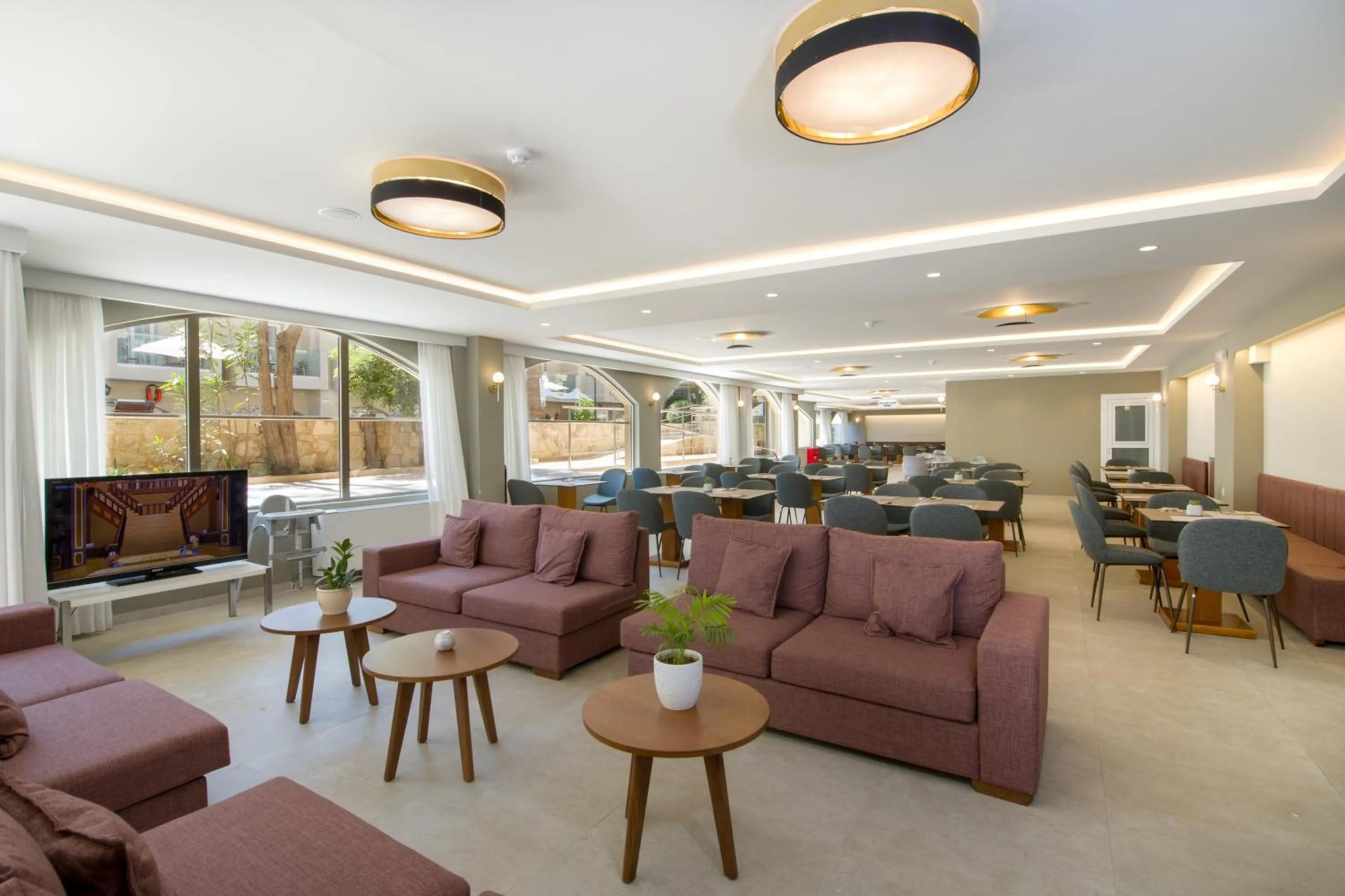 Communal lounge/ TV room in Kalyves Beach Hotel