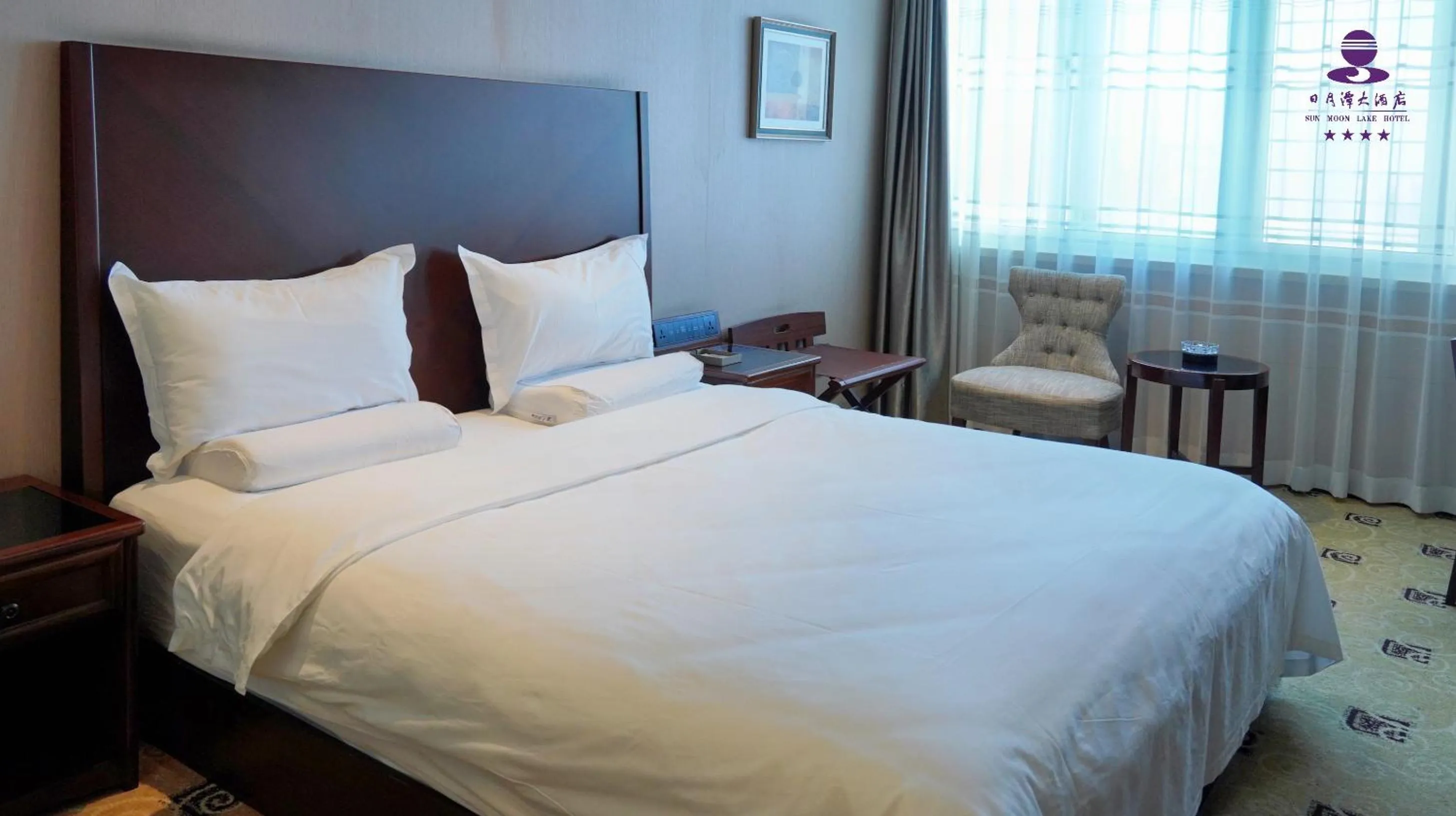 Bed in Sun Moon Lake Hotel Dalian大连火车站店