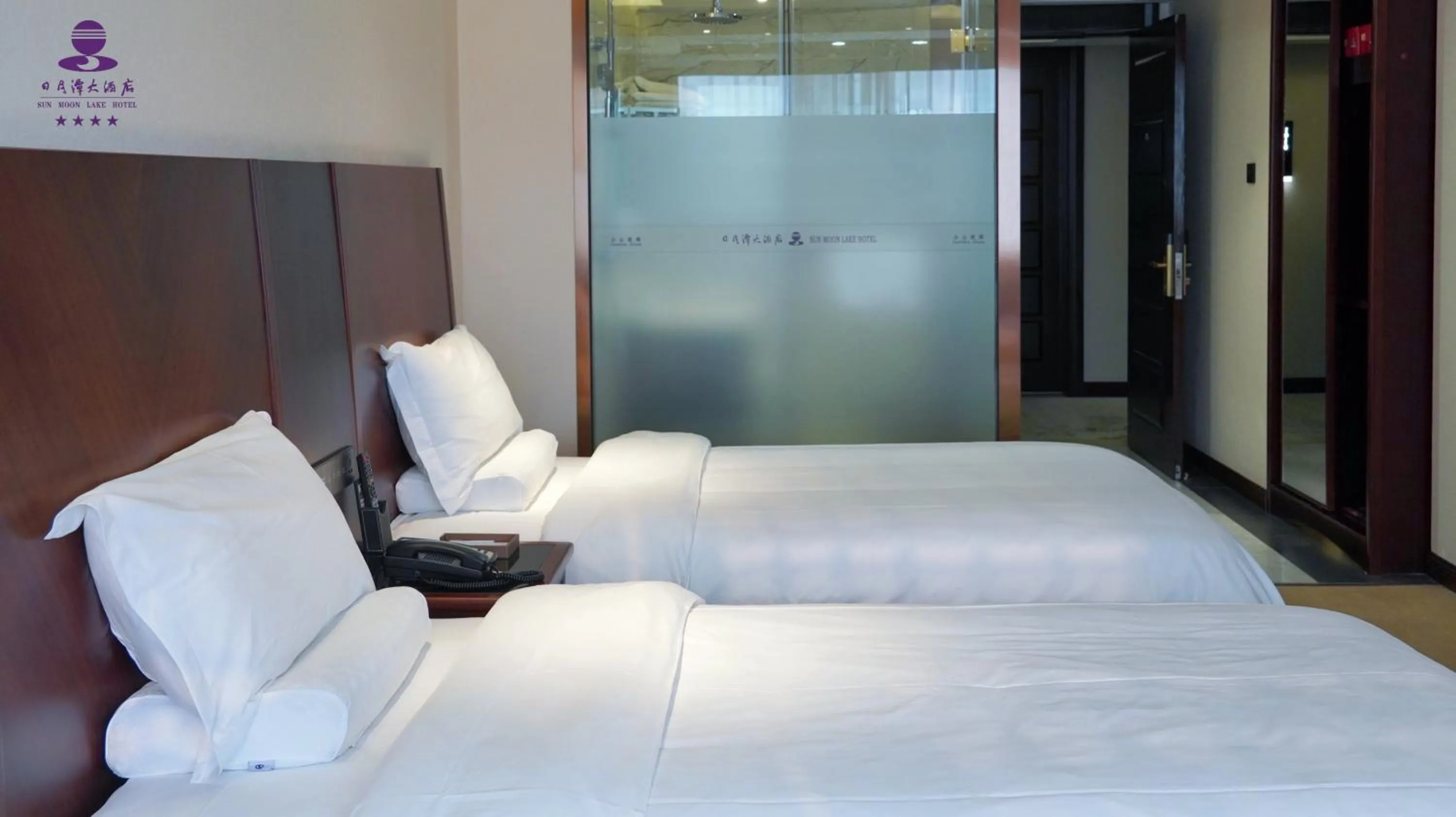 Bed in Sun Moon Lake Hotel Dalian大连火车站店