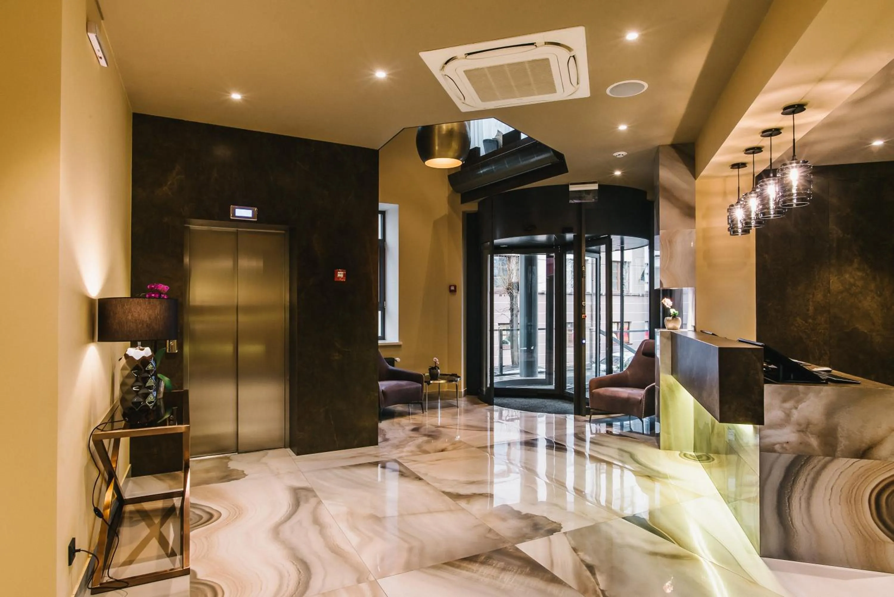Lobby or reception in Noble Boutique Hotel
