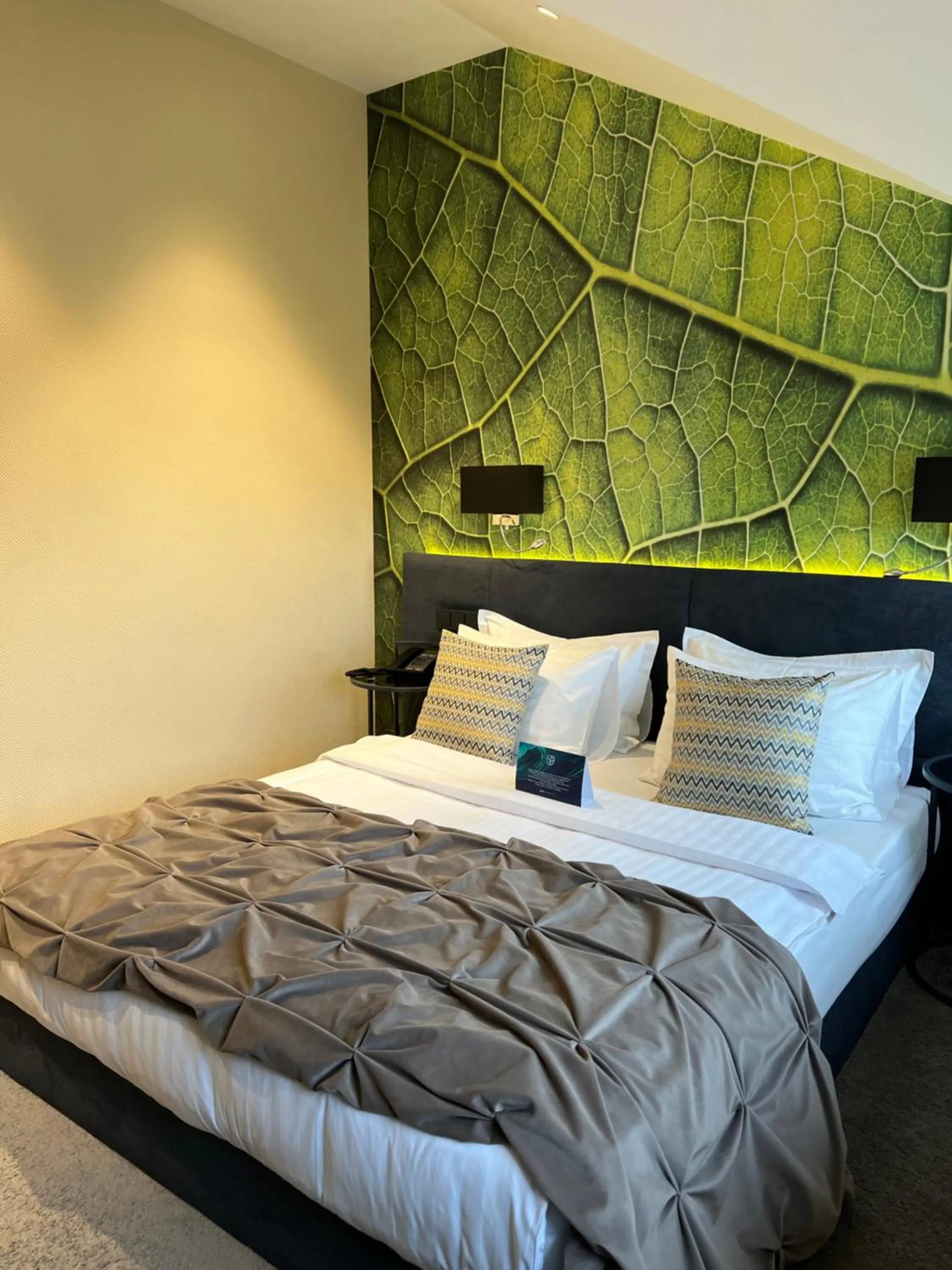 Bed in Noble Boutique Hotel