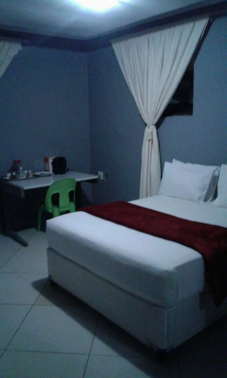 Bed in Central Lodge Hotels