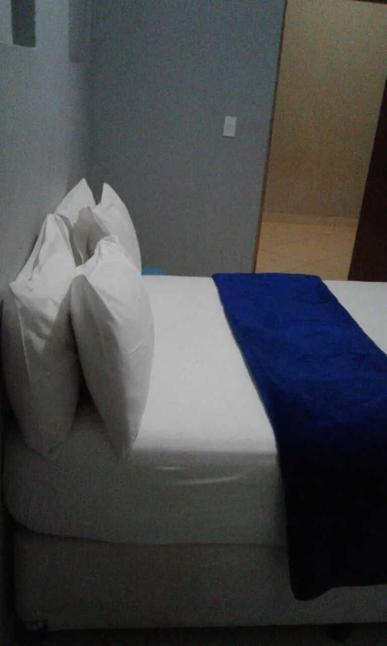 Bed in Central Lodge Hotels