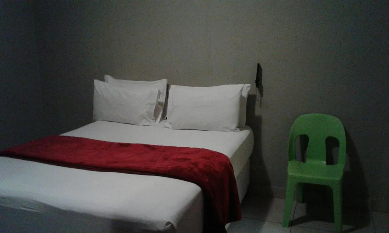 Bed in Central Lodge Hotels
