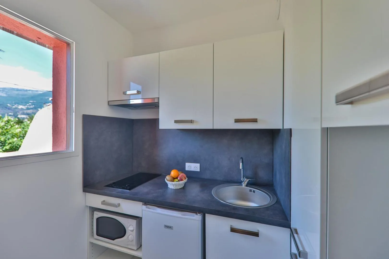 Kitchen or kitchenette in Servotel Castagniers
