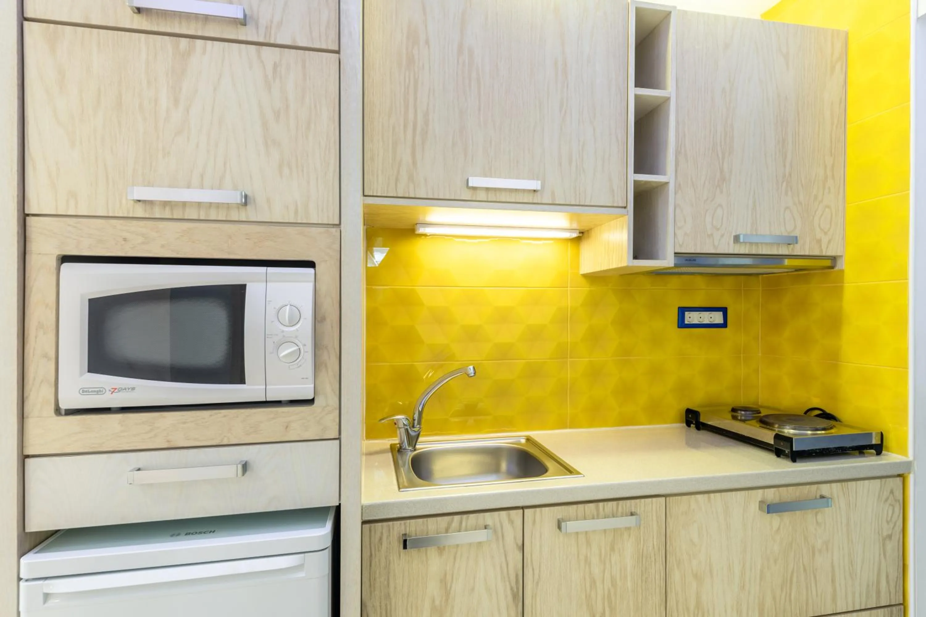 Kitchen or kitchenette in Sevach Apartments
