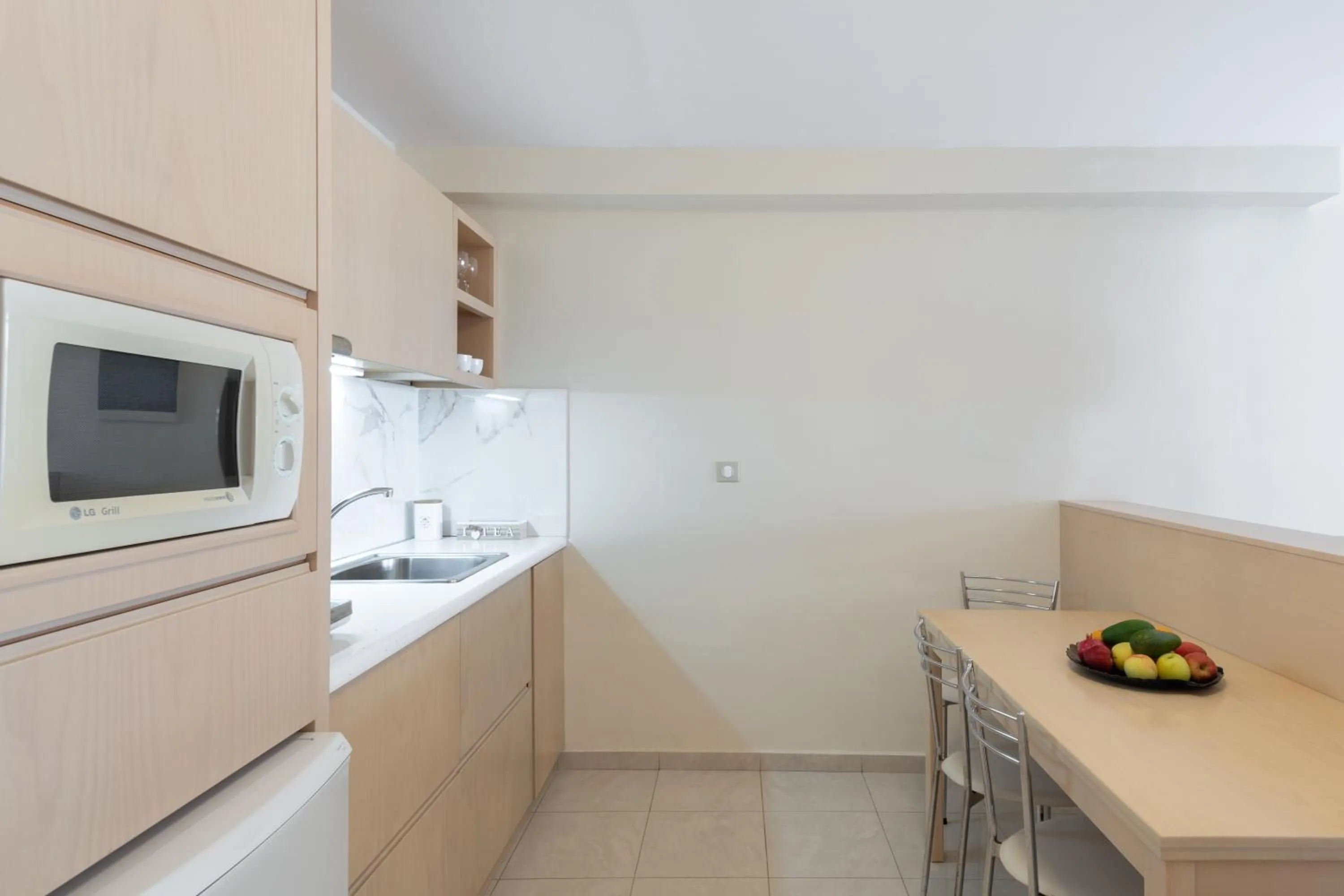 Kitchen or kitchenette in Sevach Apartments
