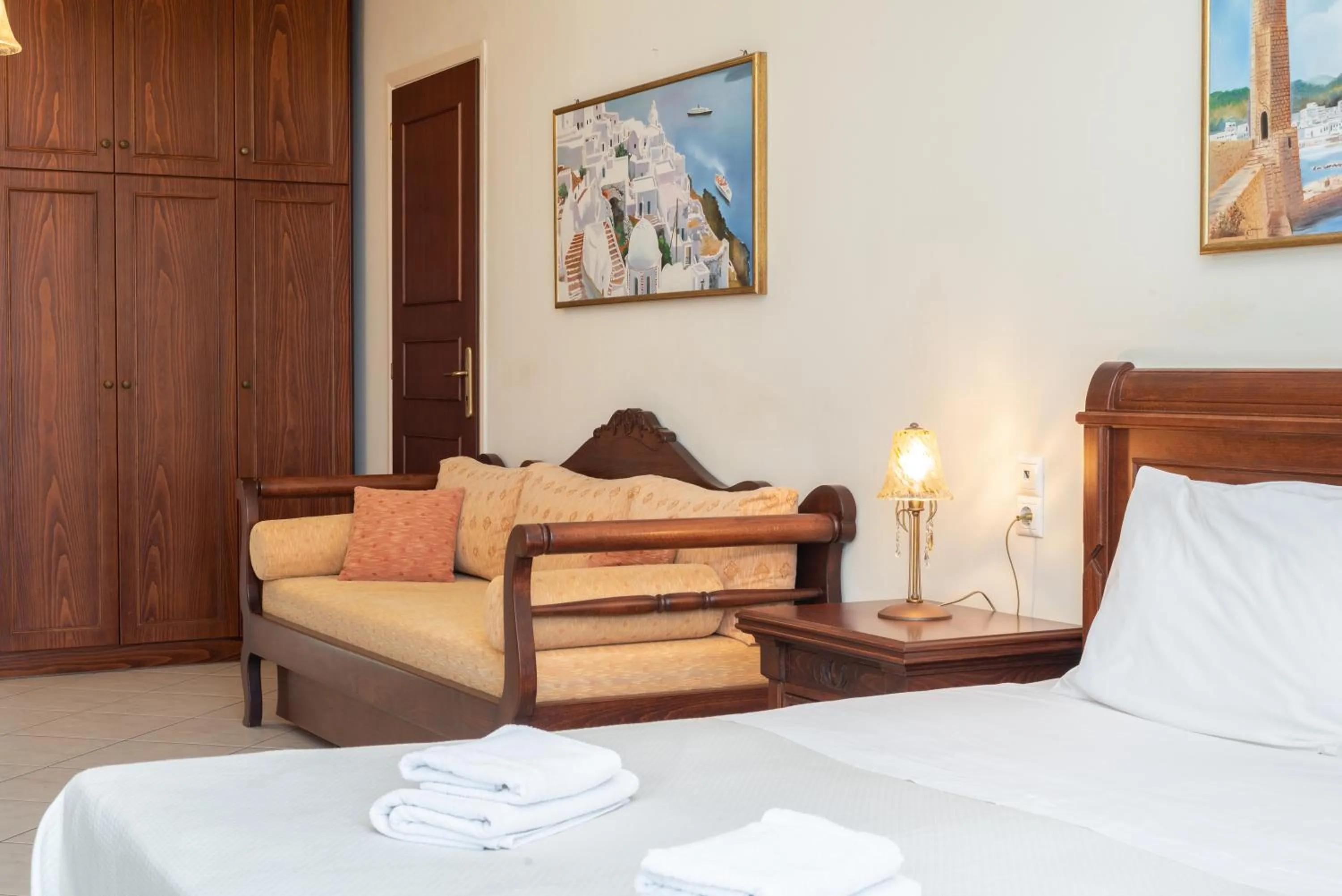 Seating area, Bed in Sevach Apartments