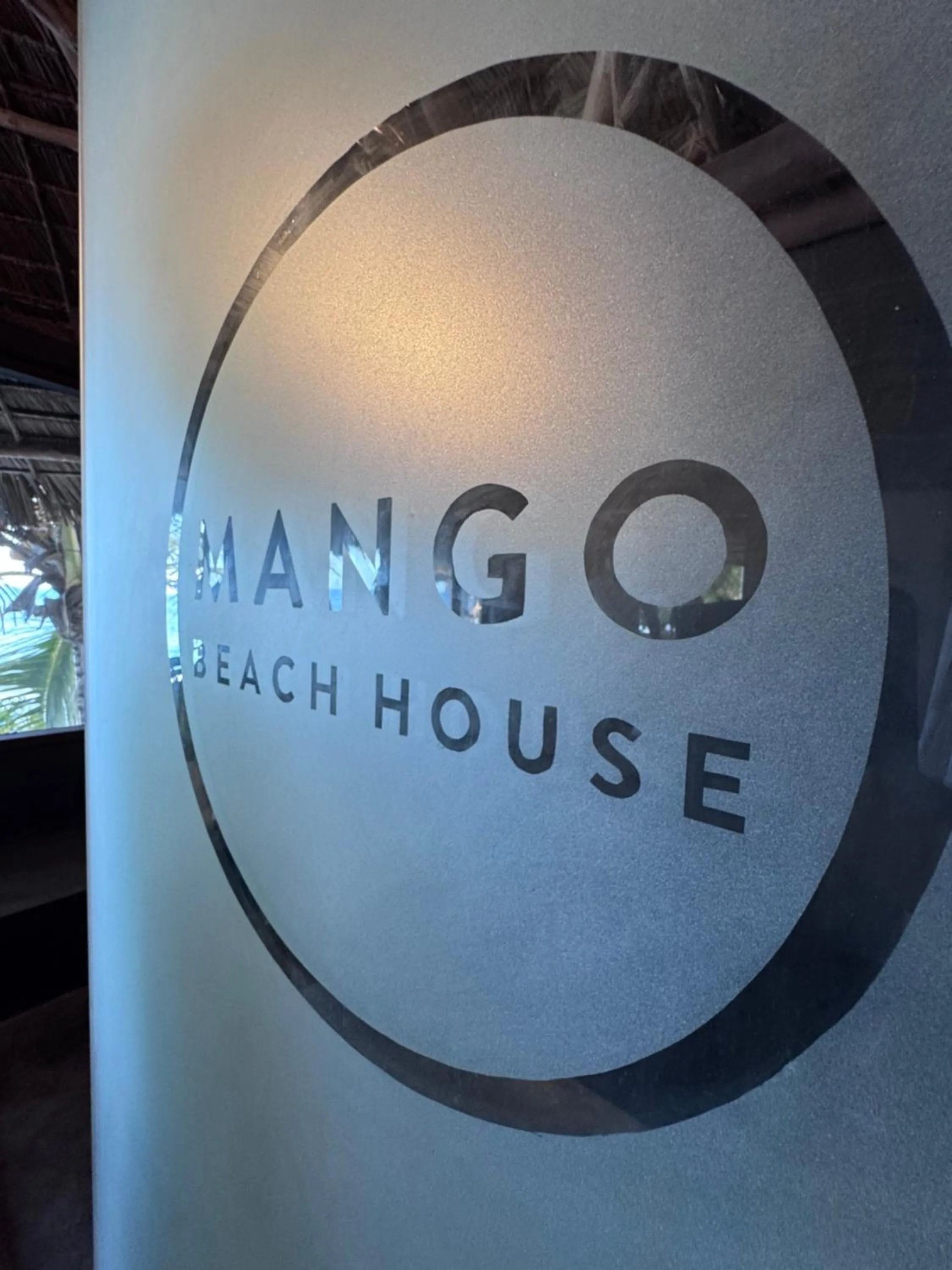 Property logo or sign in Mango Beach House