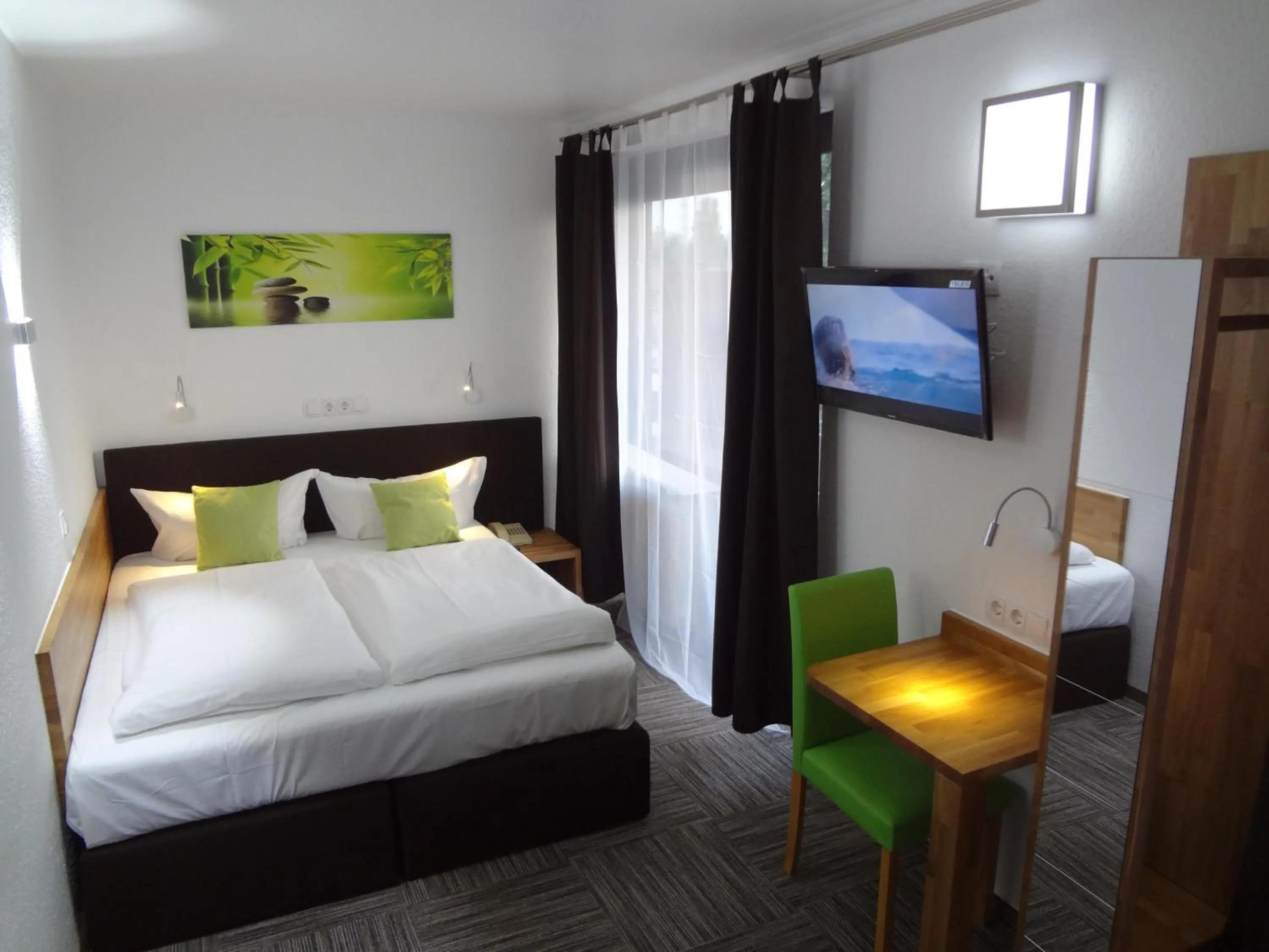 Bed in Hotel Mainbogen