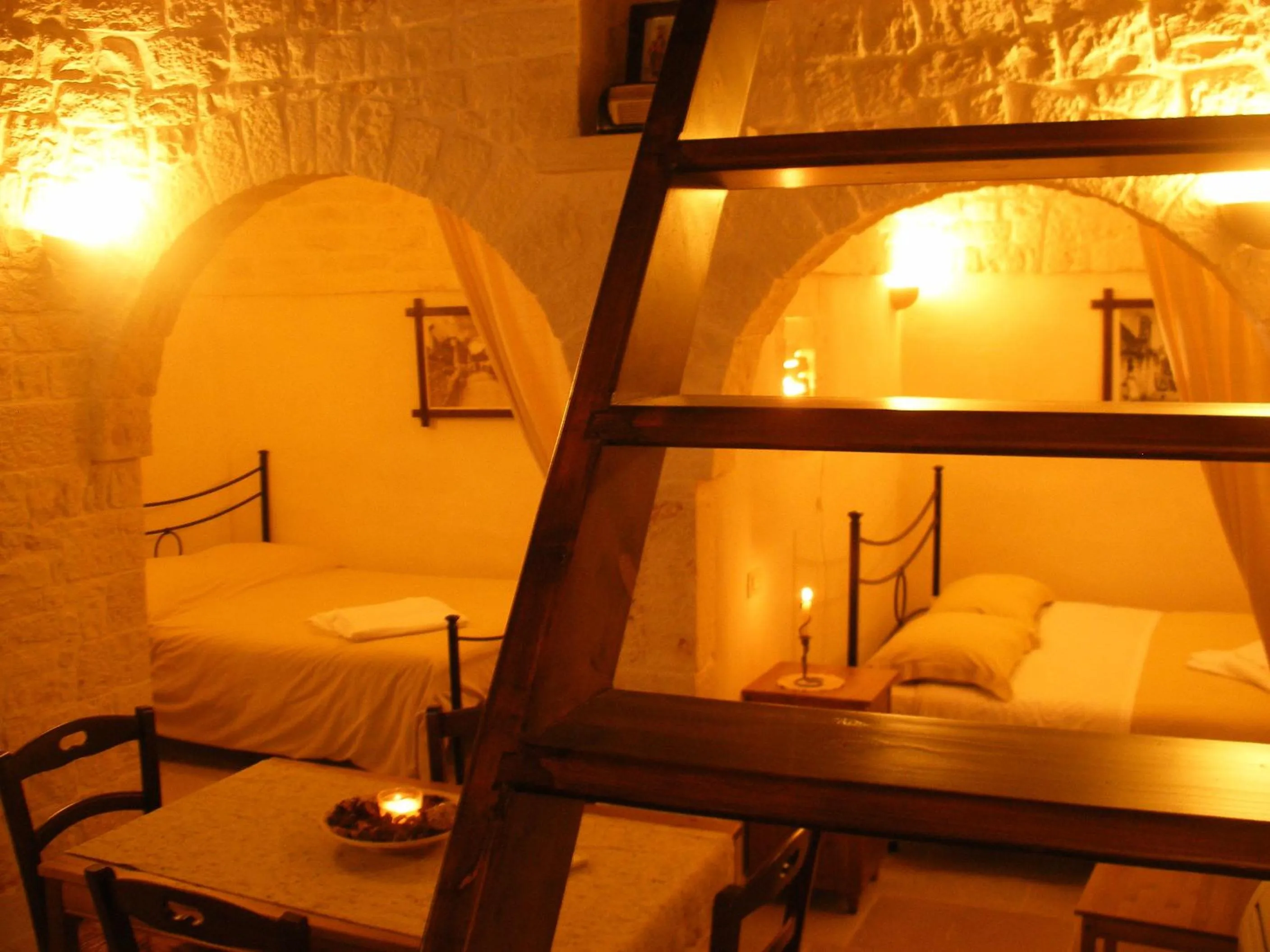 Photo of the whole room, Bed in Trulli Resort Monte Pasubio Trulli bbalberobellocom