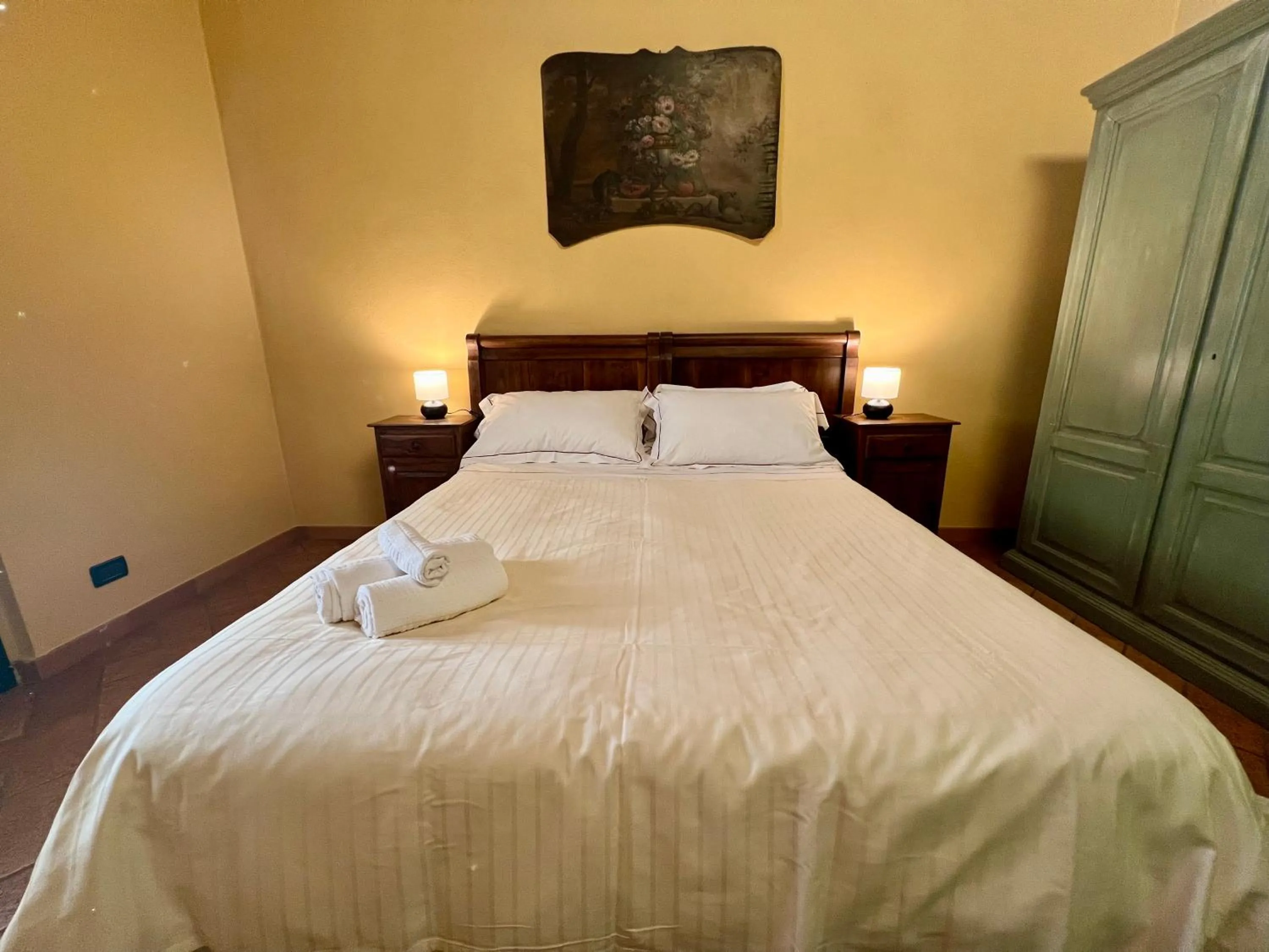 Bed in Le Serre Suites & Apartments