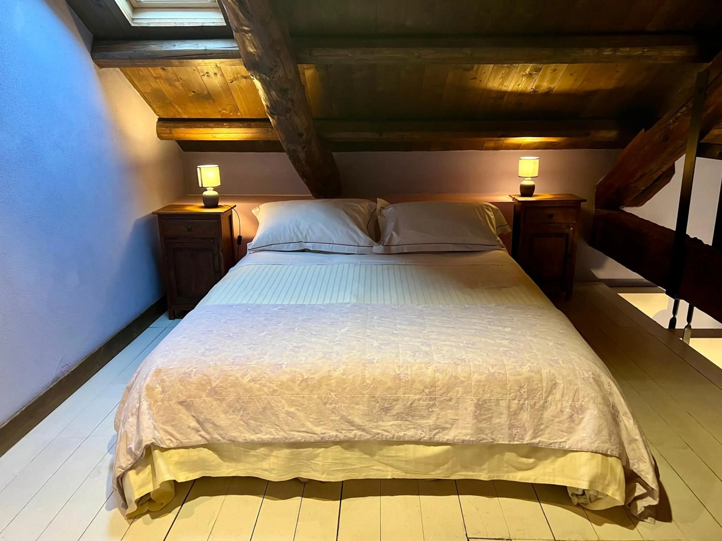 Bed in Le Serre Suites & Apartments