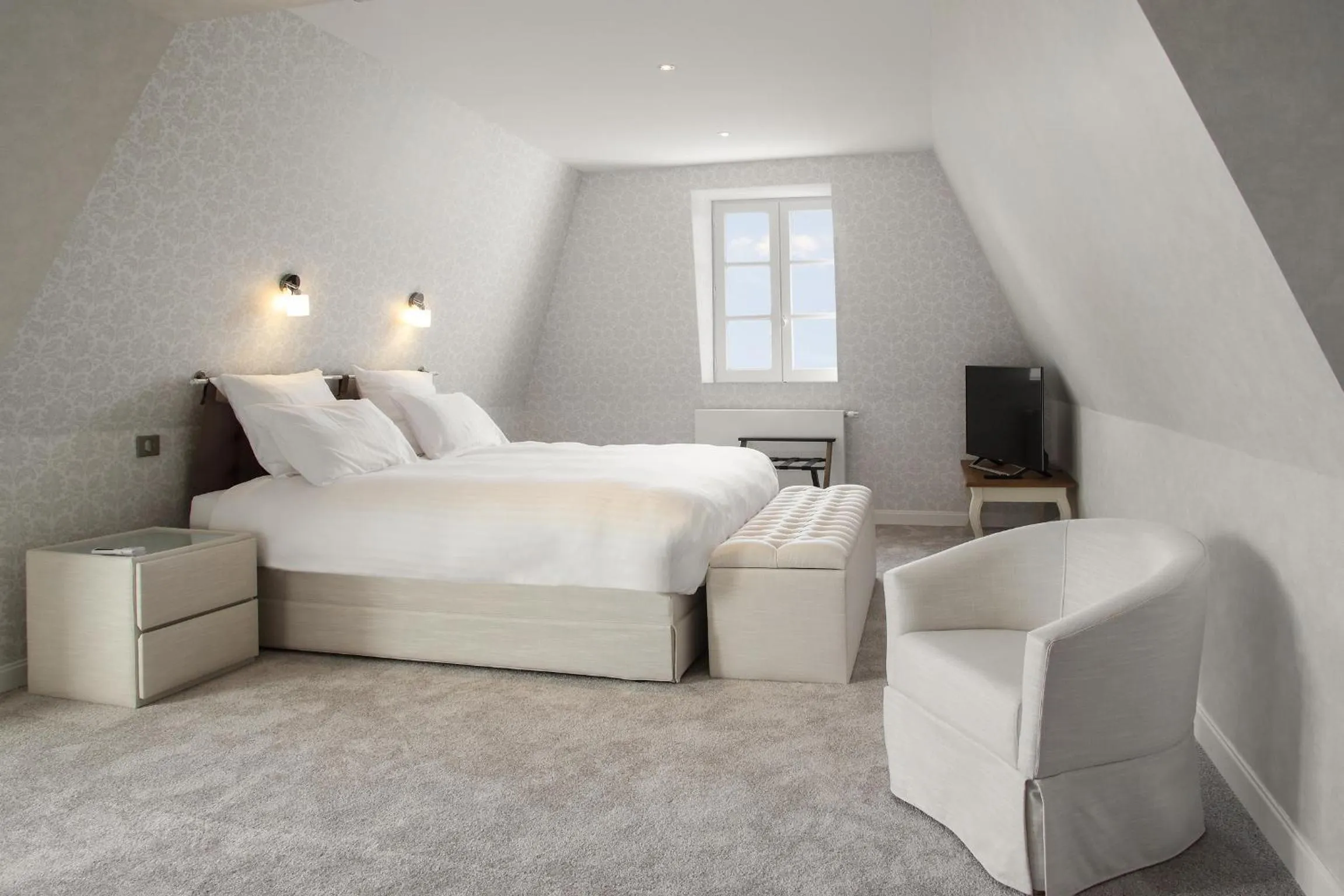 Bed in Chambres d'hotes de Pouzelande