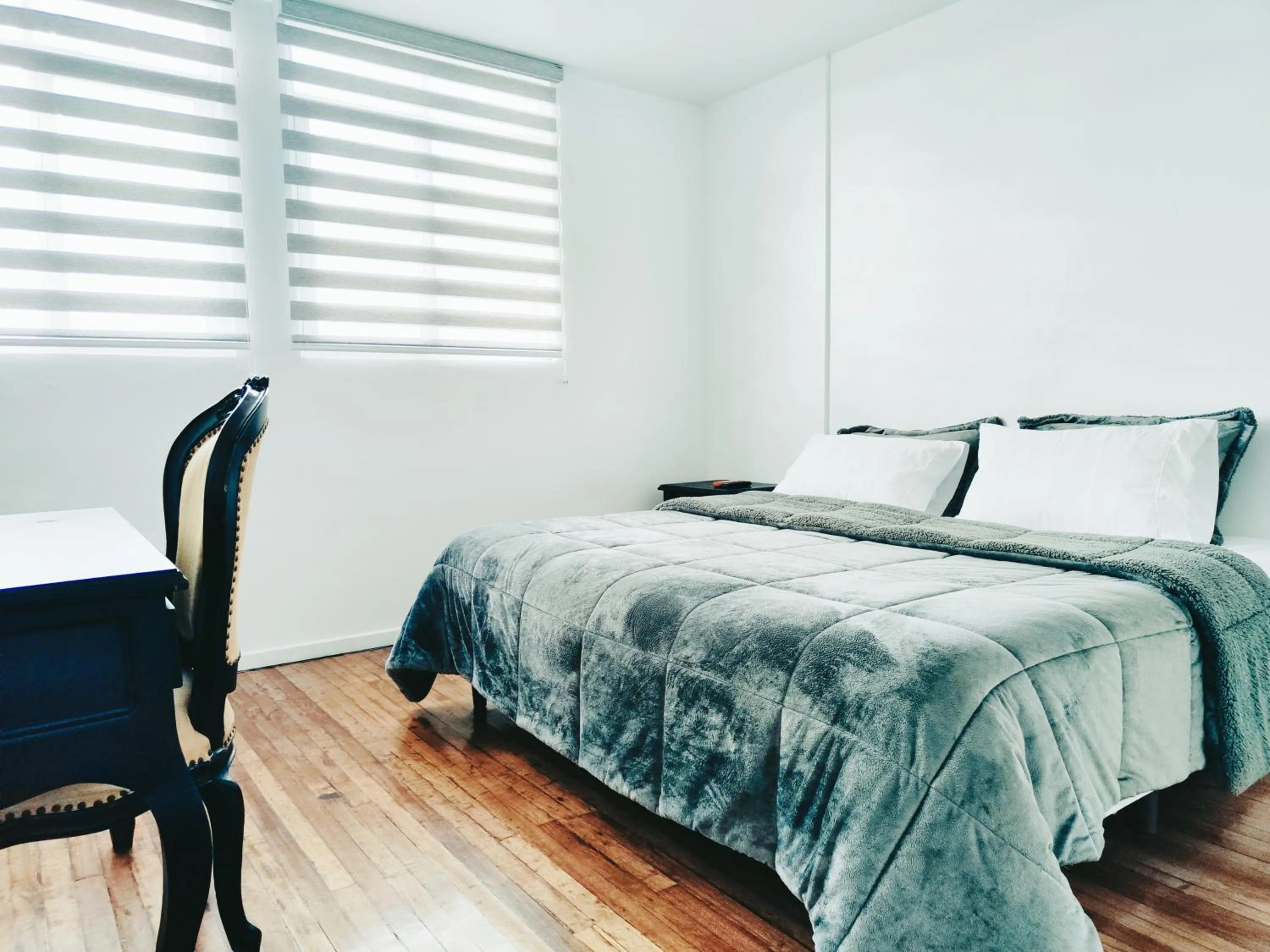 Bed in Hotel Muros Quito