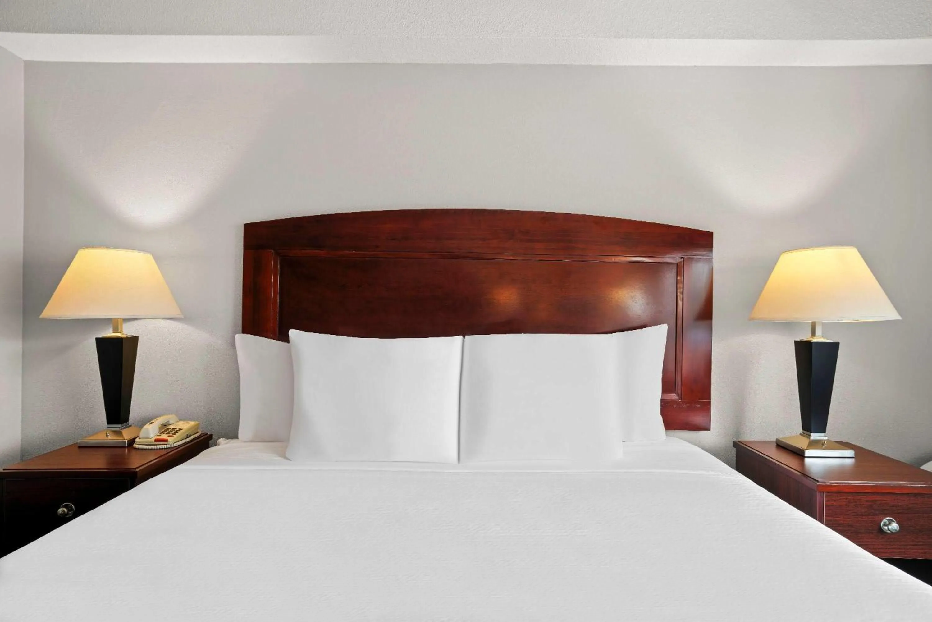 Bed in Days Inn by Wyndham Utica