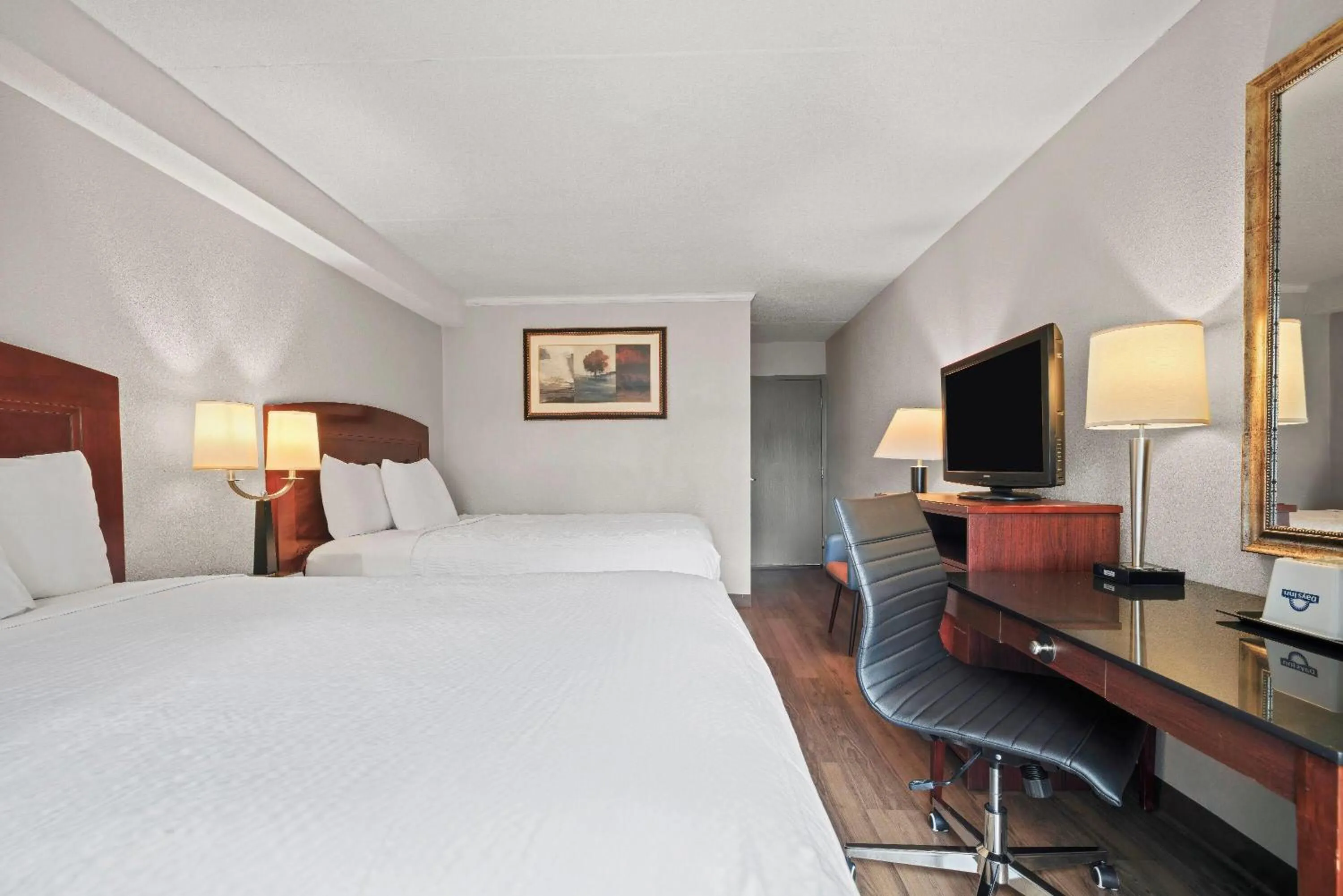 Bed in Days Inn by Wyndham Utica