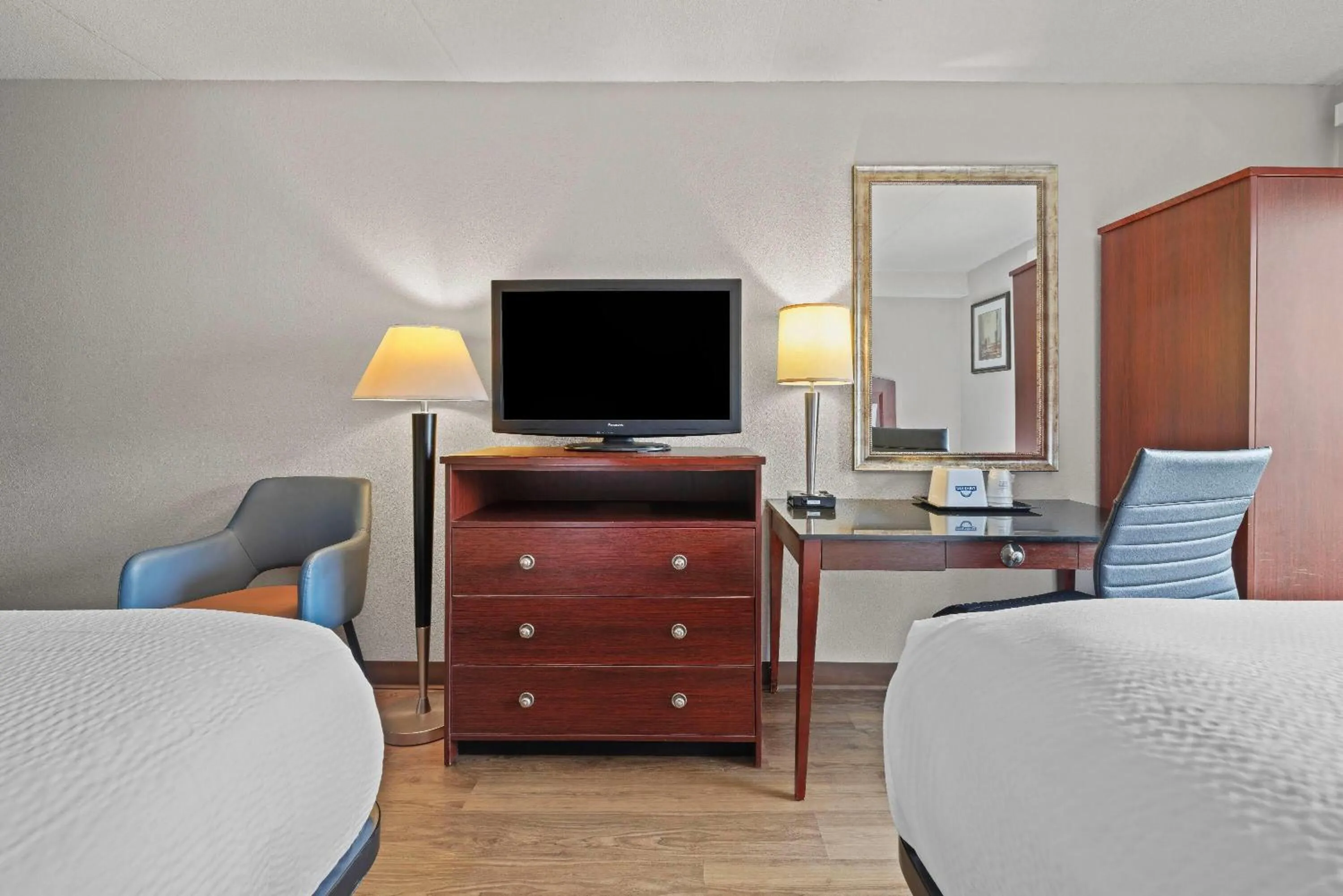 Bed in Days Inn by Wyndham Utica