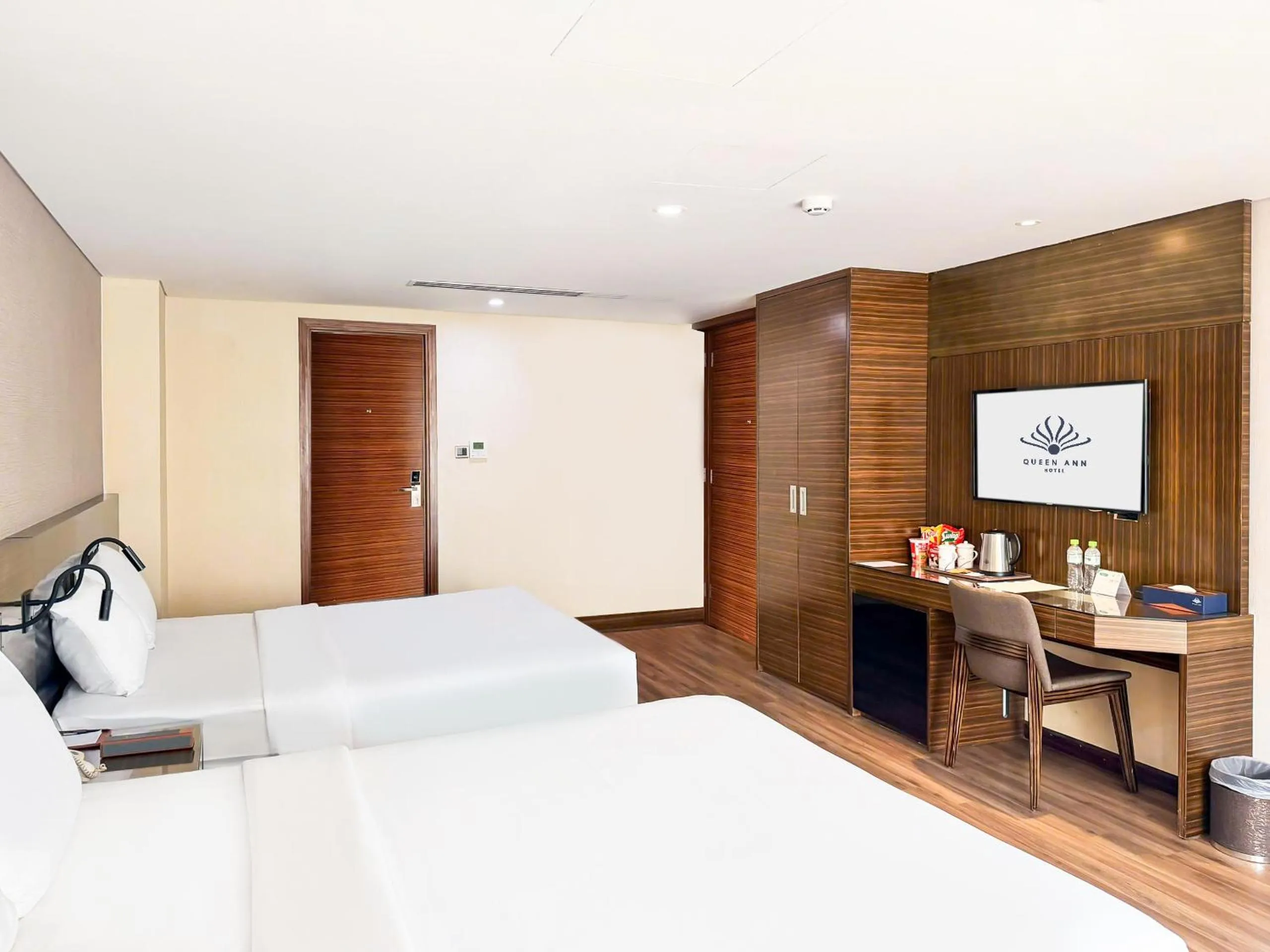 Bed in Queen Ann Hotel