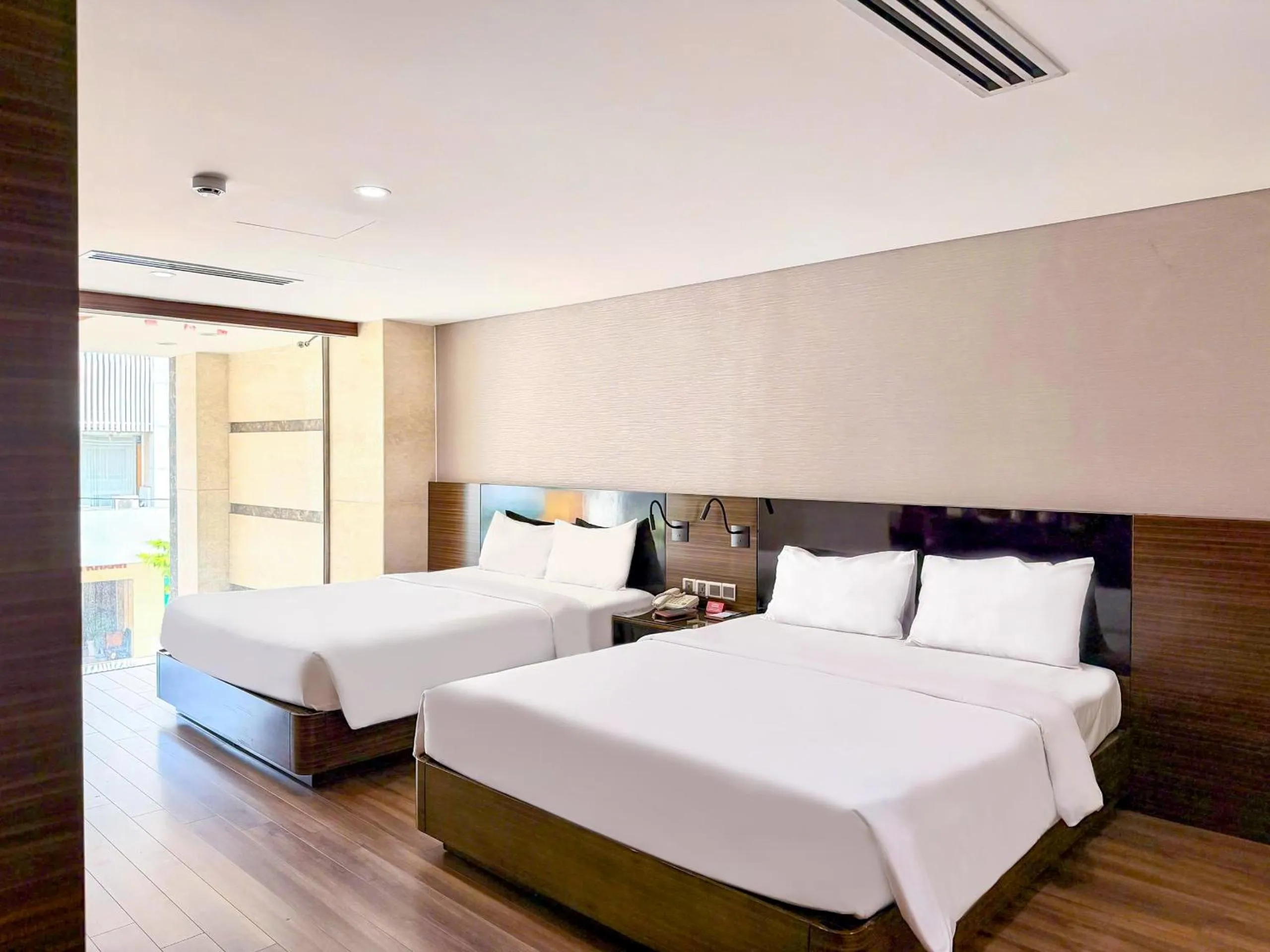 Bed in Queen Ann Hotel