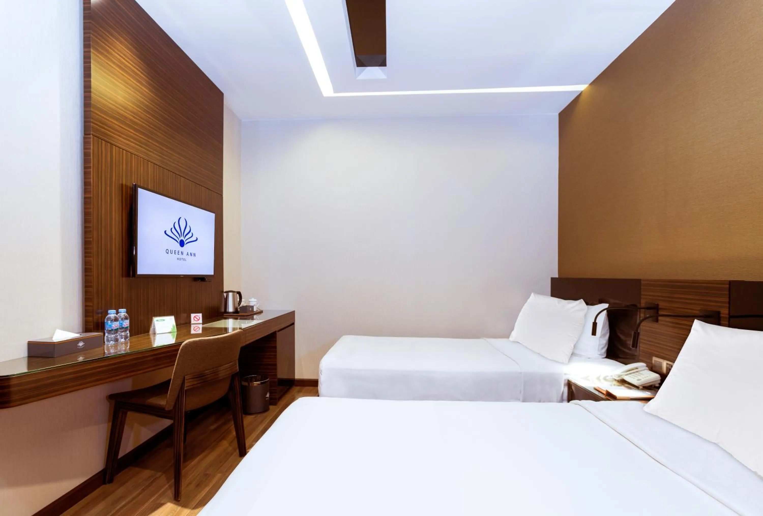 Bed in Queen Ann Hotel