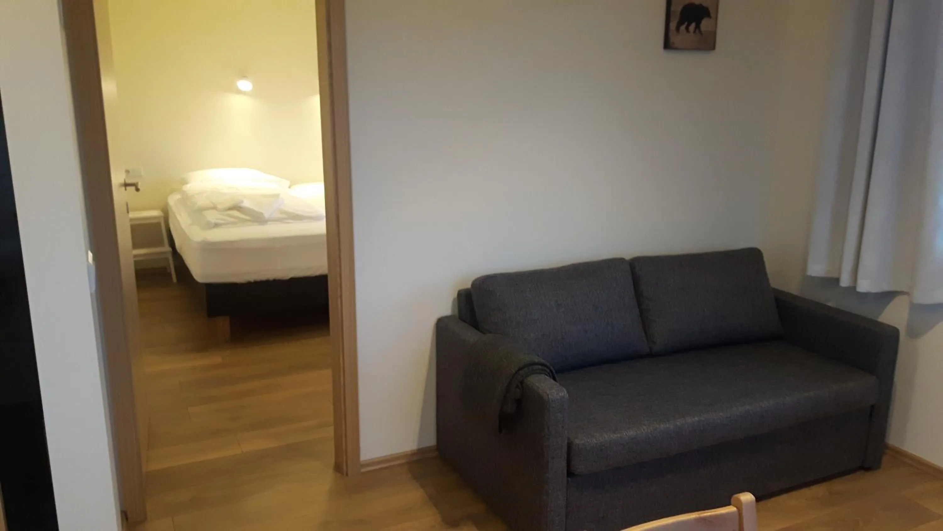 Living room, Bed in Hjartarstaðir Guesthouse