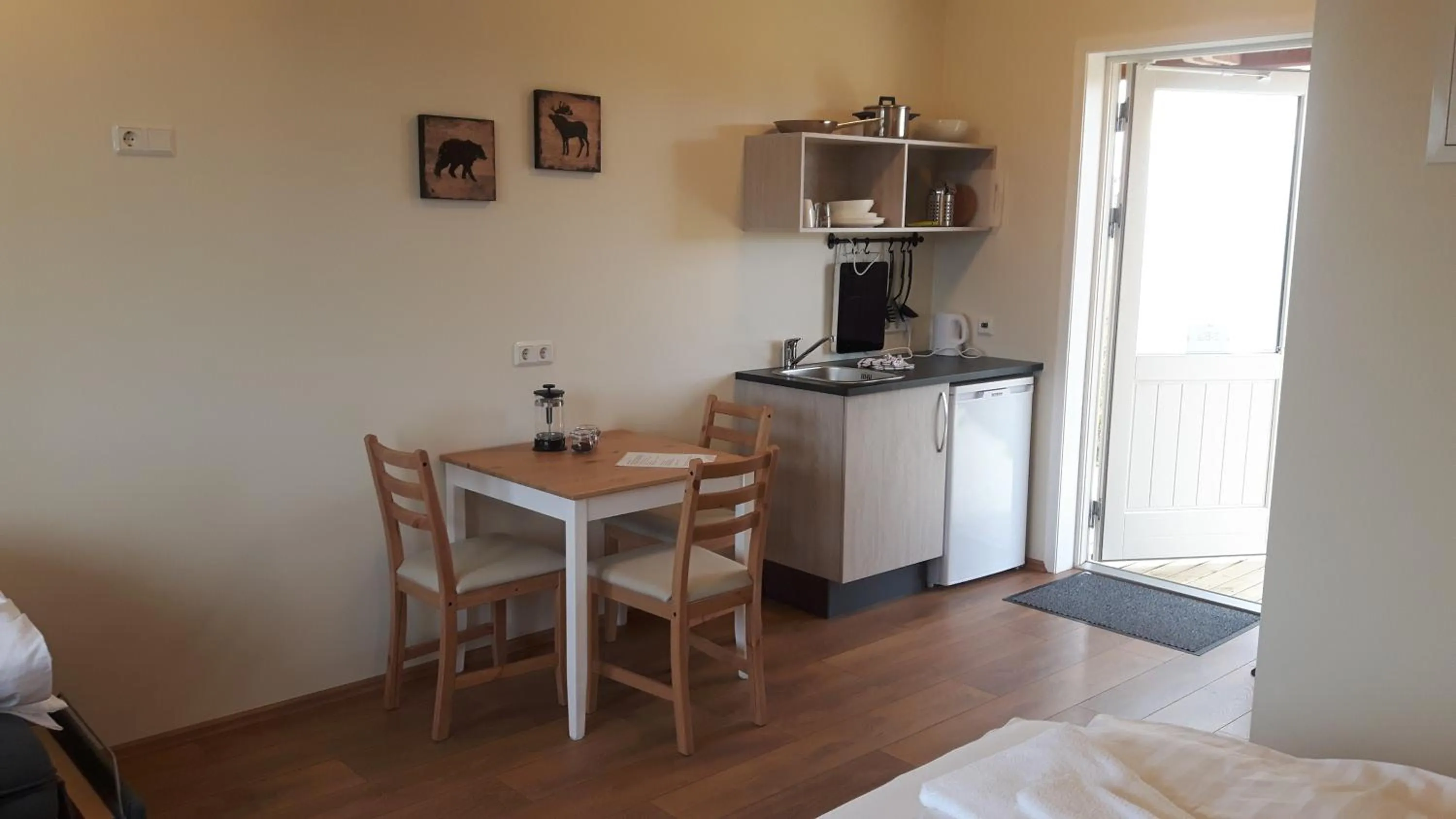 Kitchen or kitchenette in Hjartarstaðir Guesthouse