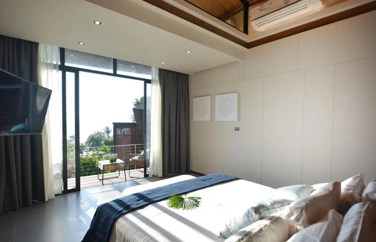 Bed in The Cabin Beach Resort